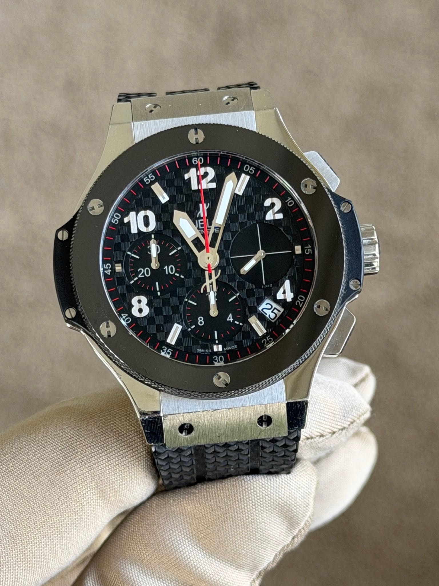 May be an image of wrist watch and text