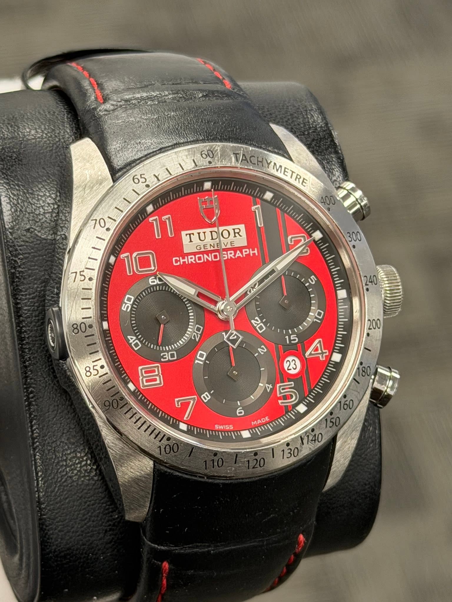 May be an image of wrist watch and text