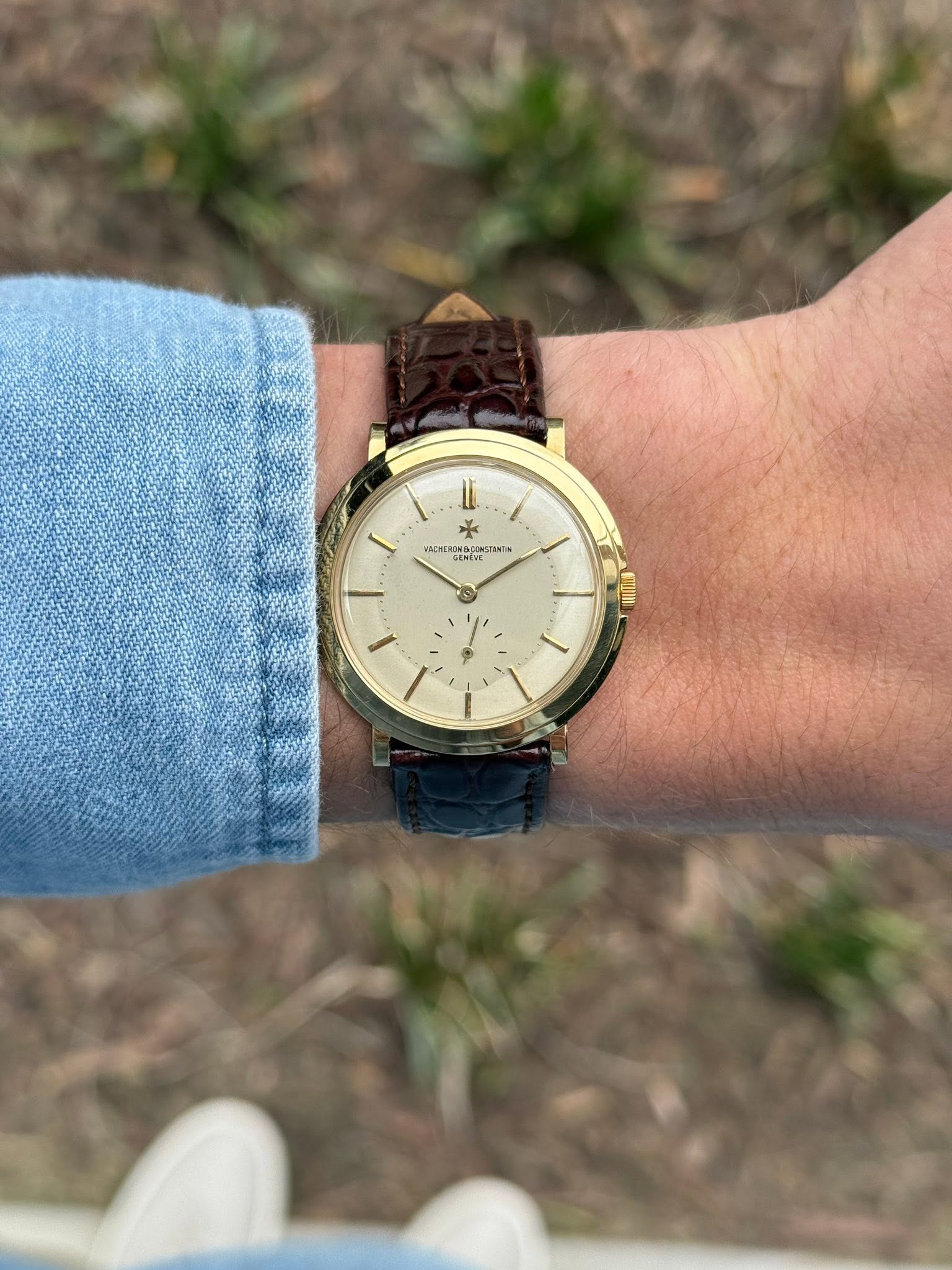 May be an image of wrist watch and text