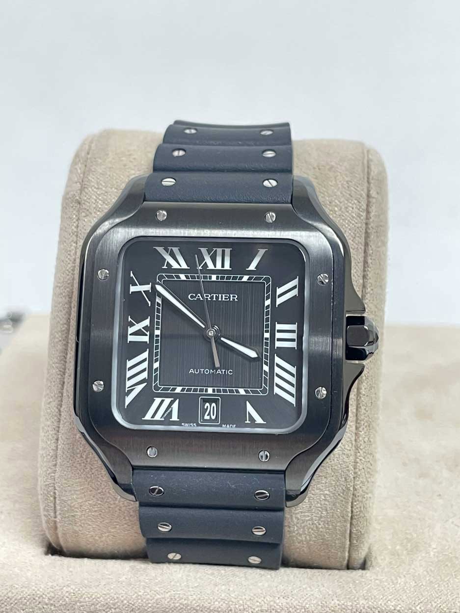 May be an image of digital watch and text that says 'נינם X IXII XXI I X IXX مم 工口 CARTIER IX VIII I1 Was 20 MAnE AUTOMATIC 三 M T C eo'