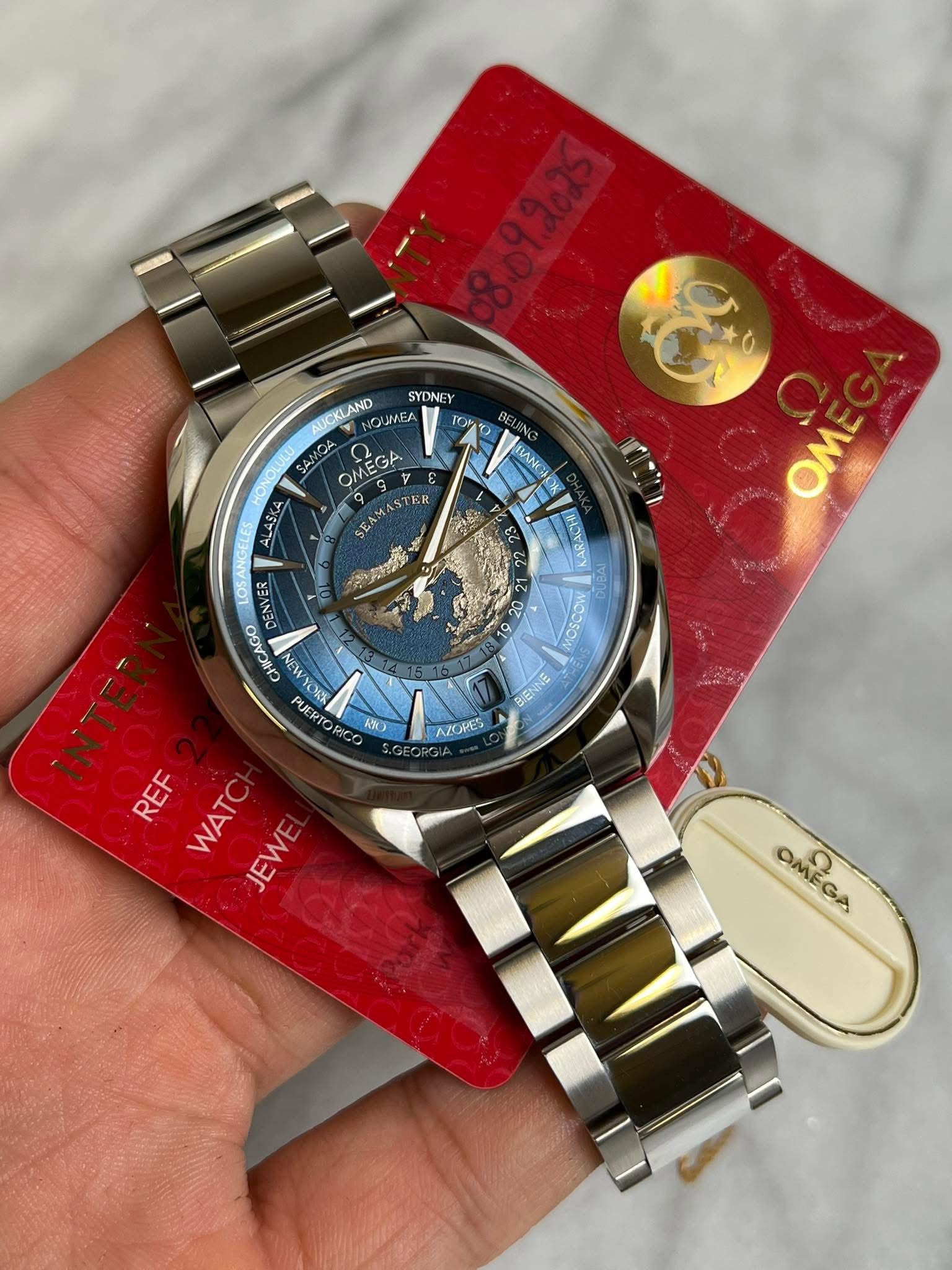 May be an image of wrist watch and text that says 'AUCKLAND NOWIEA SYD SYDNE A MEC OMEGA EЛMARTE 9 9 GA 9 SEA GS ፍኒክባና HANG o ΌΜΕ OMΣ Hp YYORK P ንን PTO pirr AO AZOVES INTER REF…