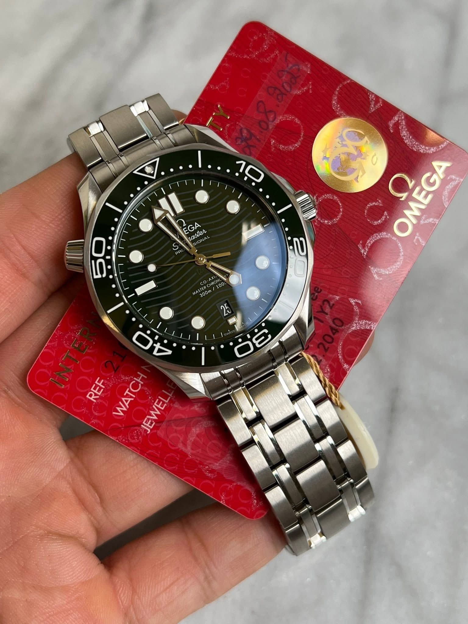 May be an image of wrist watch and text that says 'ن ?ز EGA EGA af obes S ب 50 Sun a OMEGA အေကဝယ လ 25 ن INTĘ INT REF WATCH JEWEL JEWEL ن'