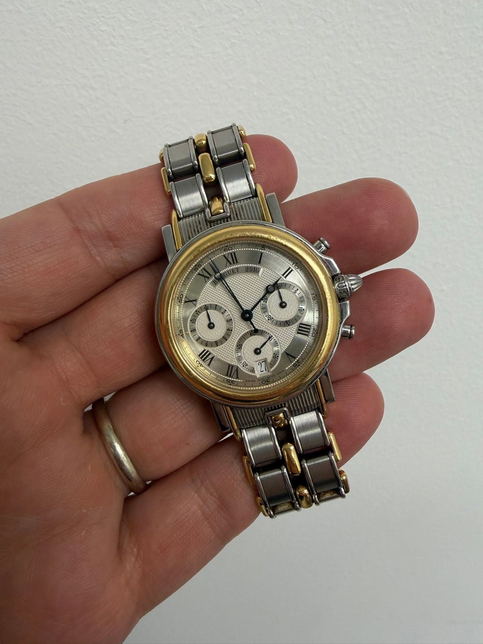 May be an image of wrist watch