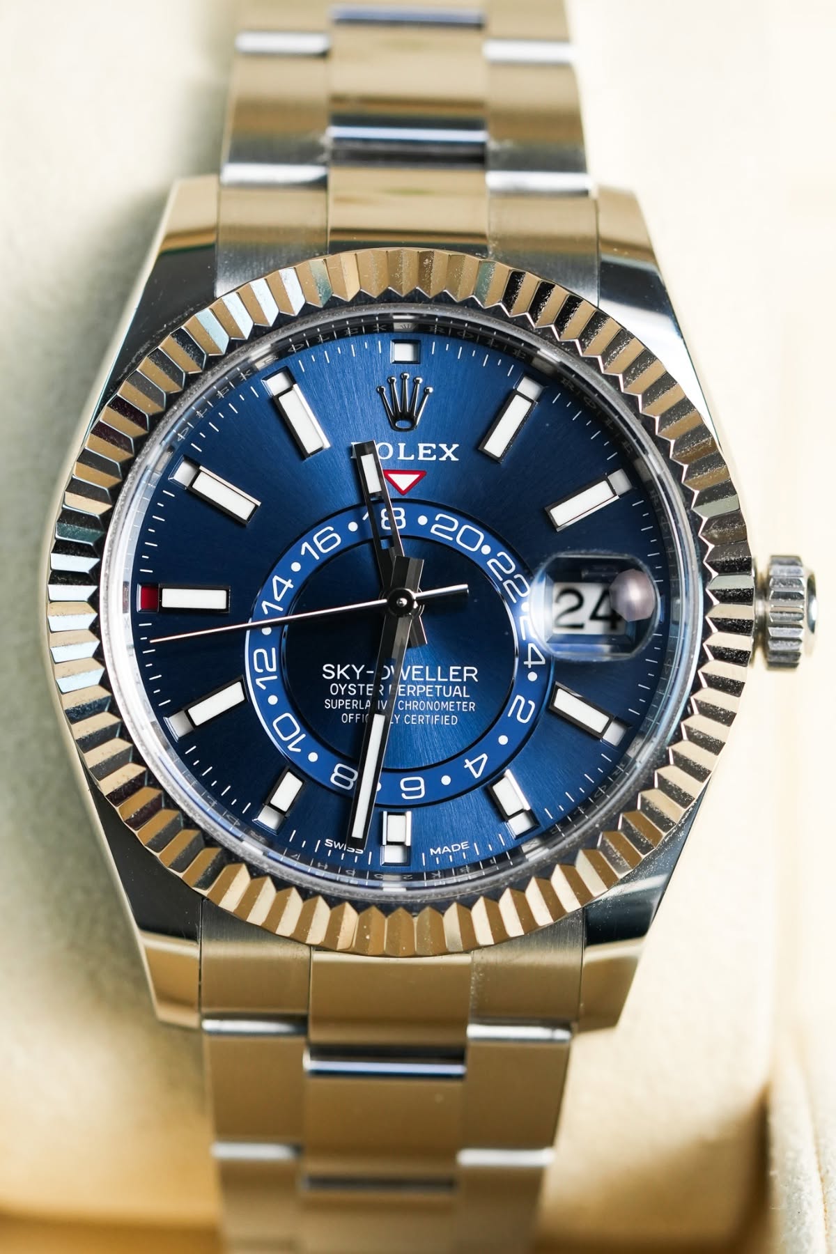 May be an image of wrist watch and text