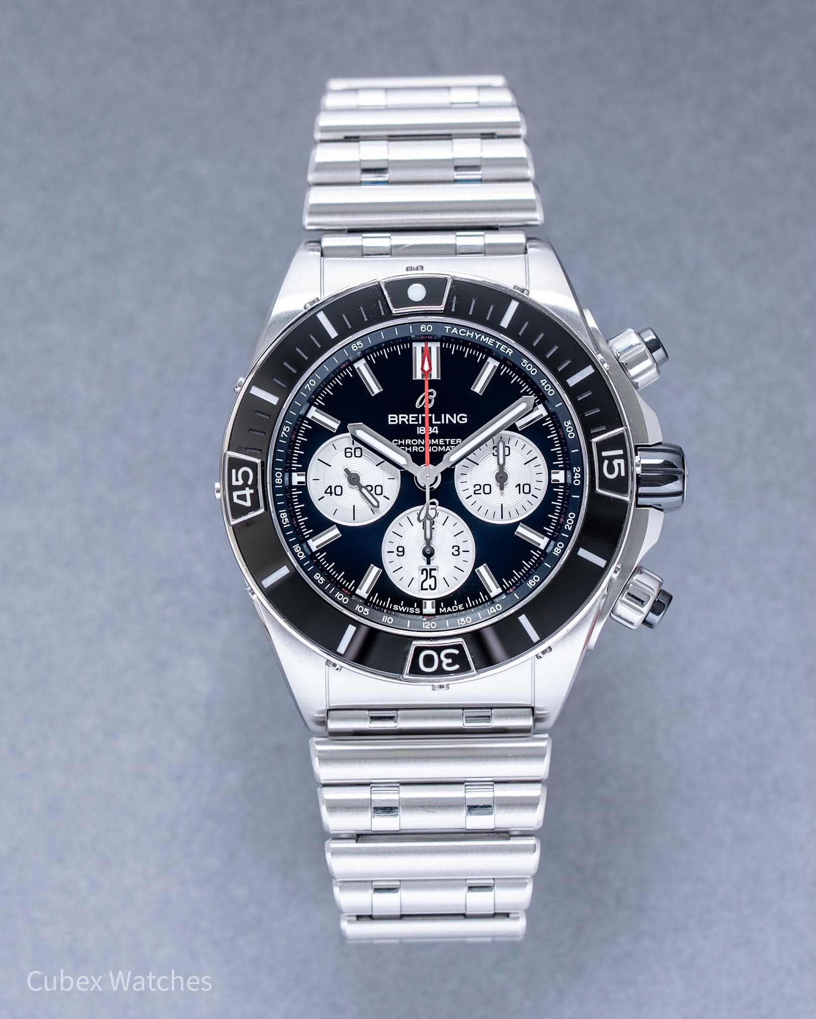 May be an image of wrist watch and text