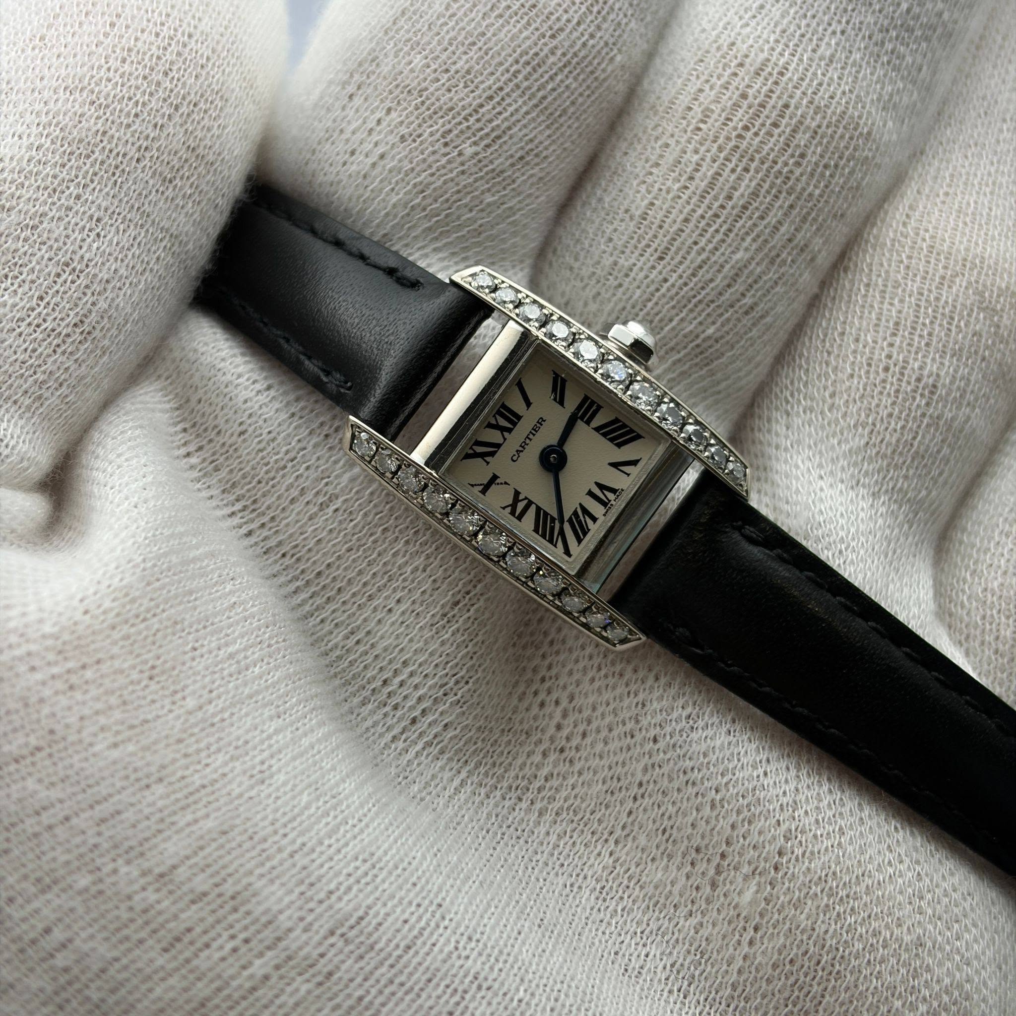 May be an image of wrist watch
