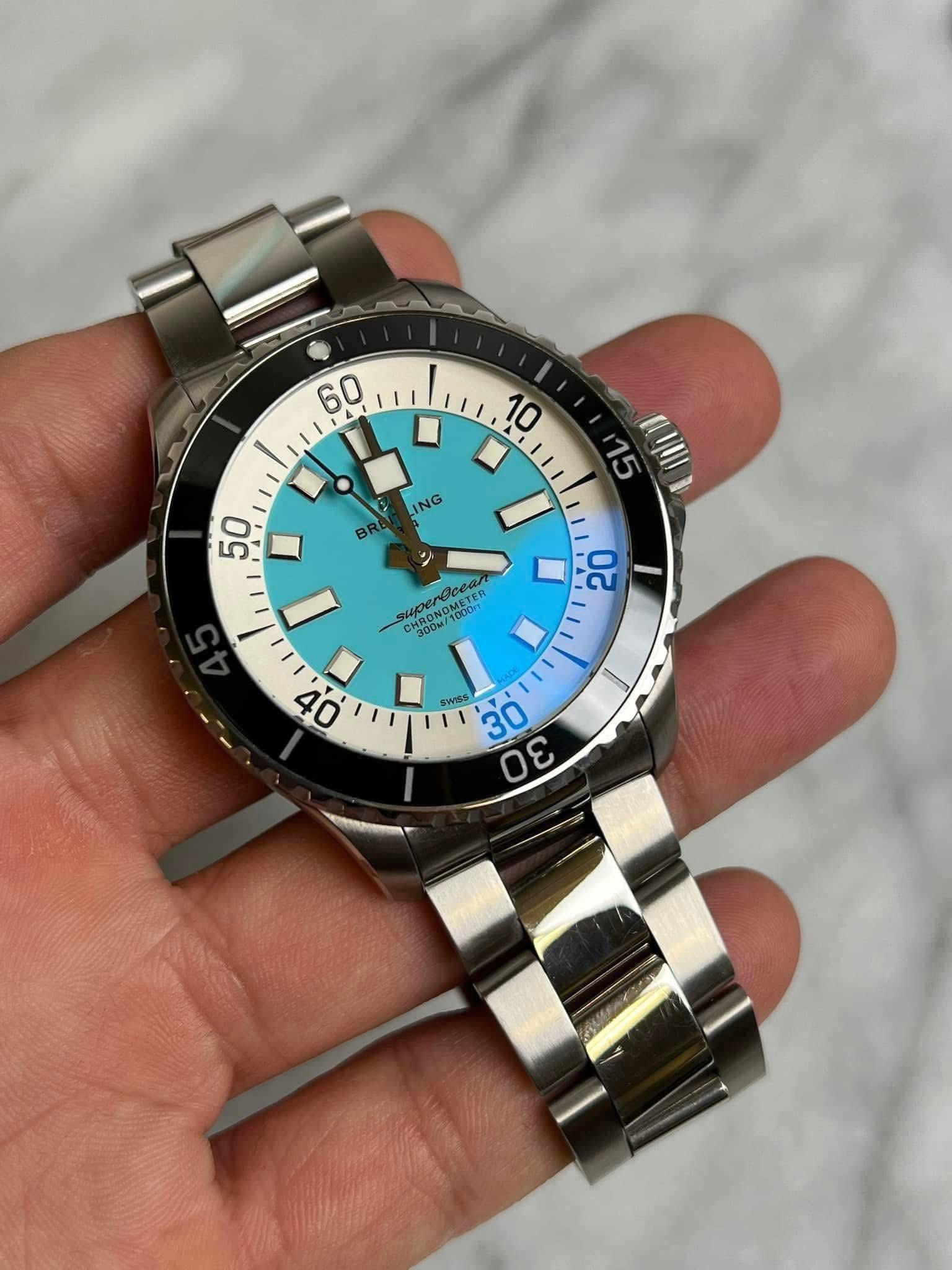 May be an image of wrist watch and text