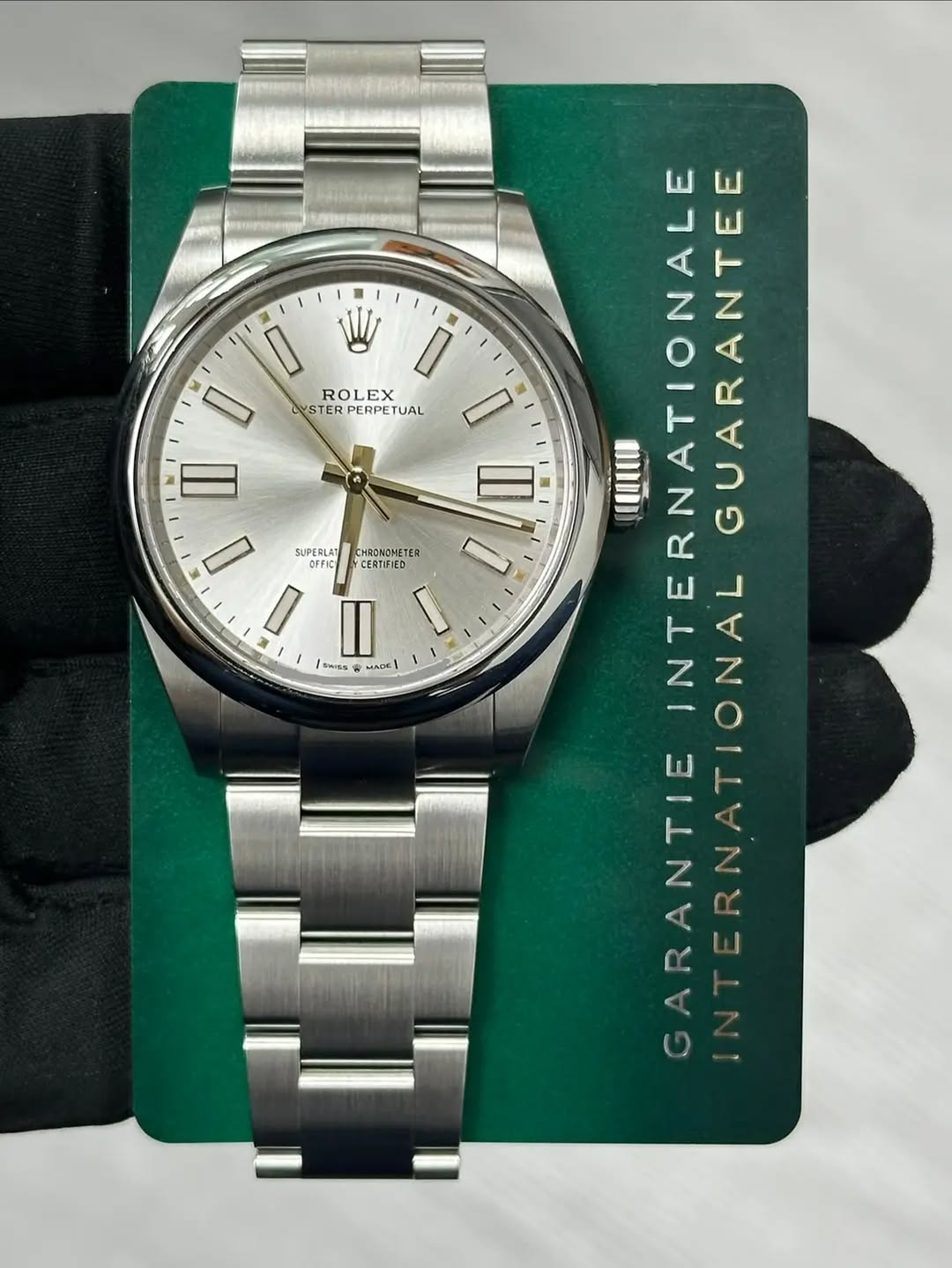 May be an image of wrist watch and text that says 'W 0 D ROLEX LYSTER TER PERPETUAL LYSTERPERPETUAL TUAL YSTERPERPE II CERTIFIED SHRNROMETE CHROWOMETER I SUPERLAT I II SHIES MIEO…