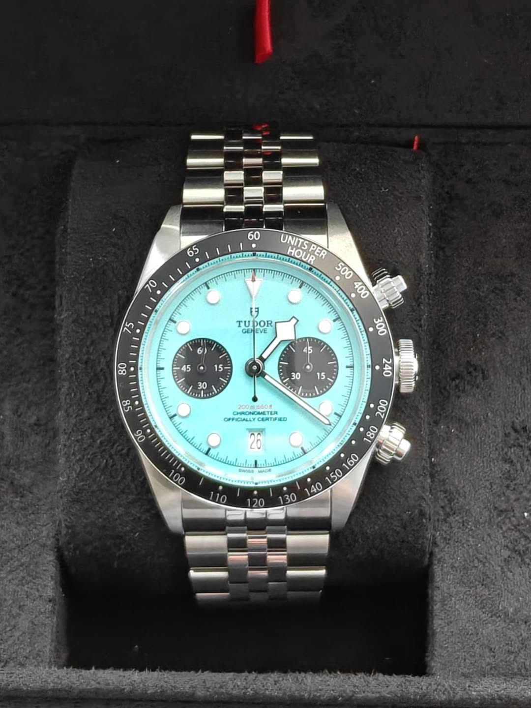 May be an image of wrist watch and text