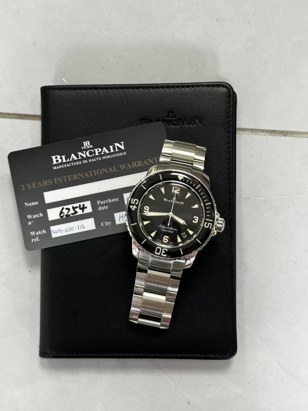May be an image of digital watch and text that says 'BLANCPAIN BLANCPAIN JR HORLOGERIE MANUFACTURE 12 BLA BLAN PAIN Name Watch atch -254 date Purchase n° Watch 7iS ref. כ X ያ…