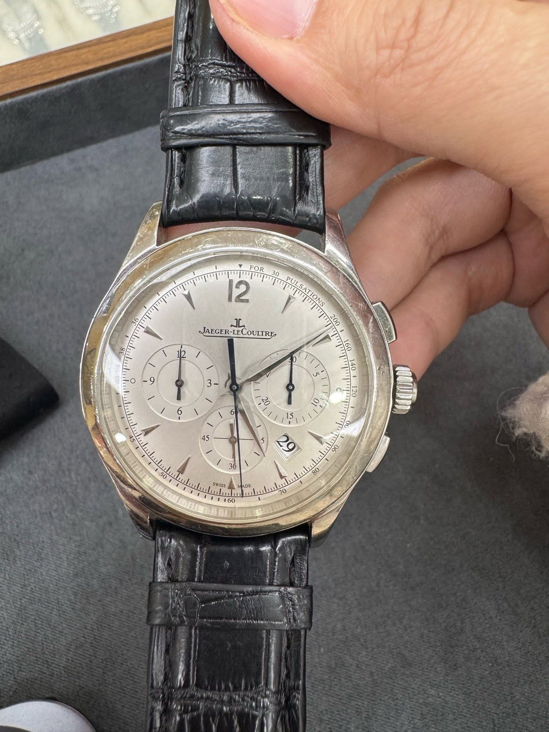 May be an image of wrist watch and text