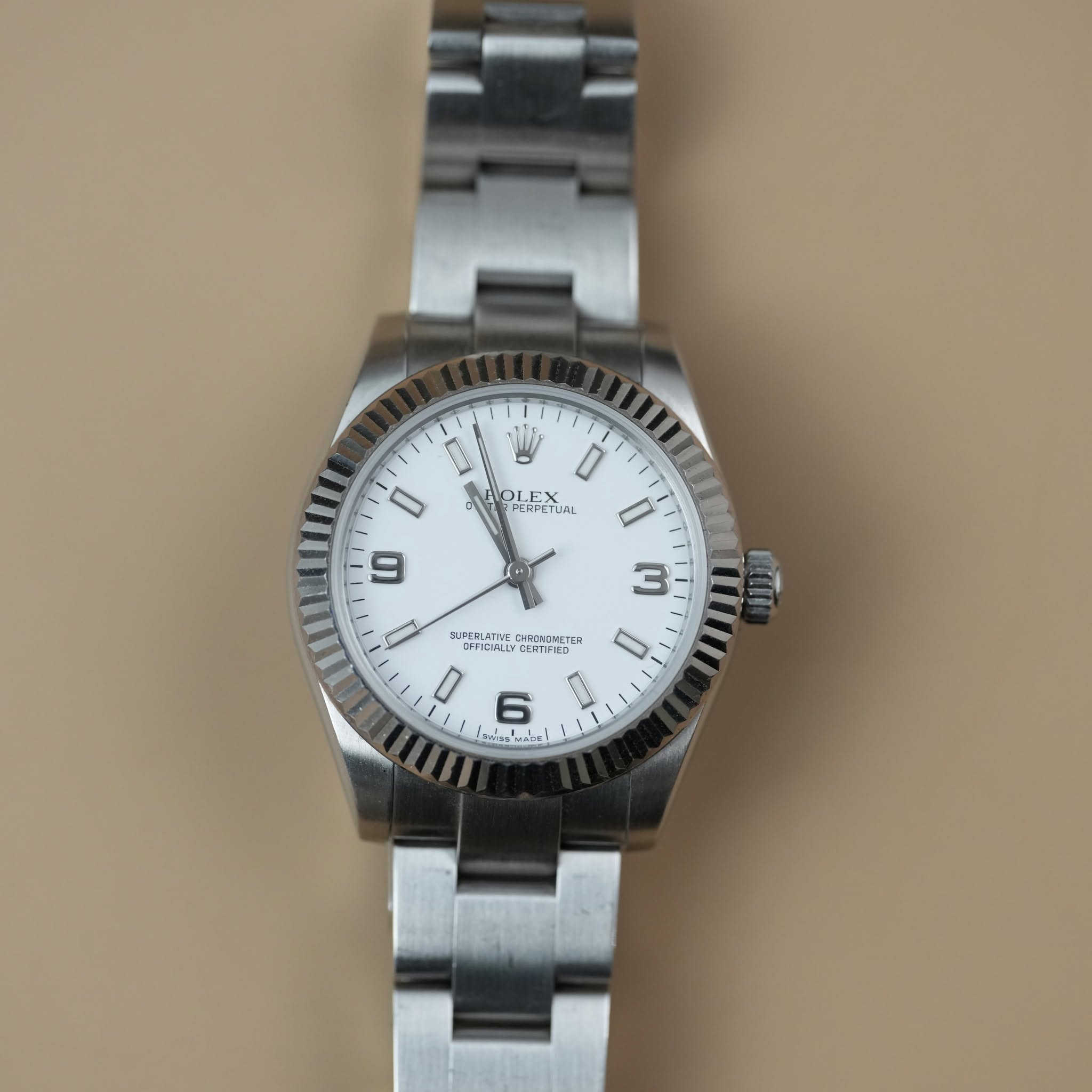May be an image of wrist watch and text