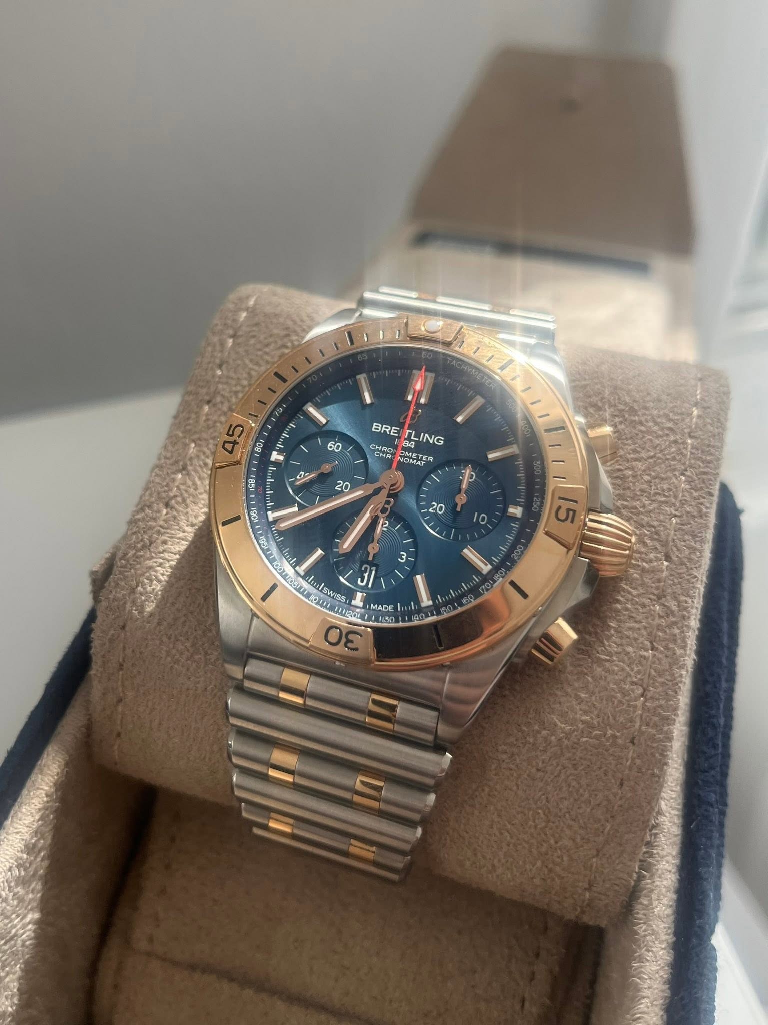 May be an image of wrist watch and text