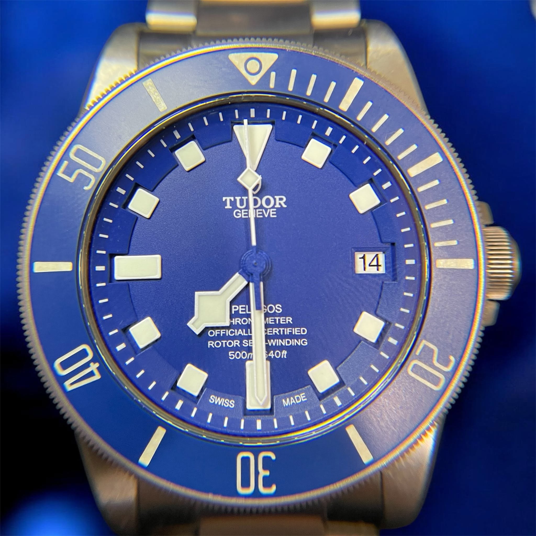 May be an image of wrist watch and text that says '50 TU TUbOR GE EVE 14 PEL PELLSOS GOS HRO ETER OFFICIALL OFFICIALLERTIFIED CERTIFIED ROTORS ROTORSEL-WINDING SE WINDING 500m 40ft…