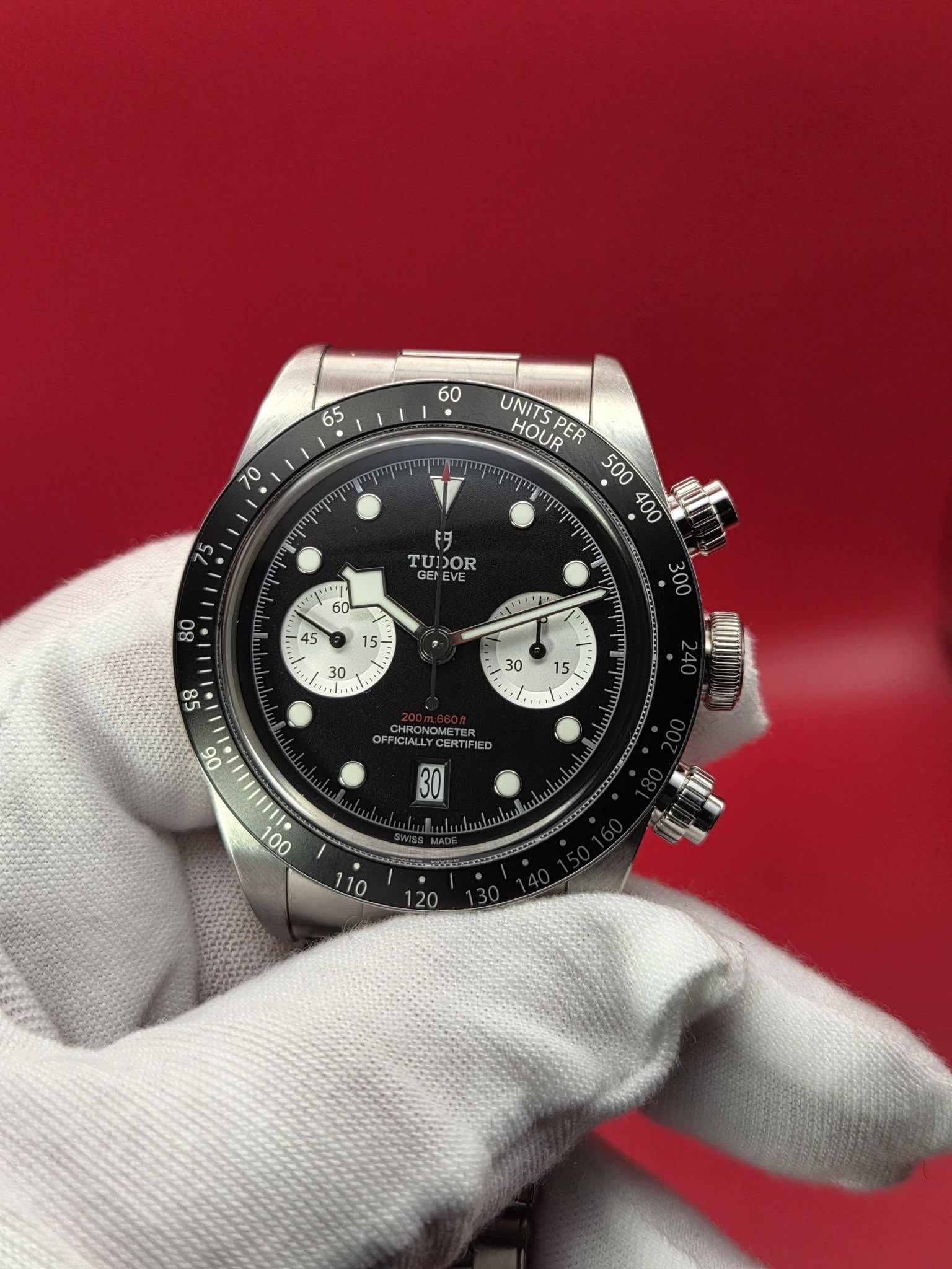 May be an image of wrist watch and text that says '60 65 70 पर UNITS HOUR PER Eタ TUDOR GENEVE - οσε 30 30 wil. CHRONOMETER OFFIC OFFICIALLYCER FIED '