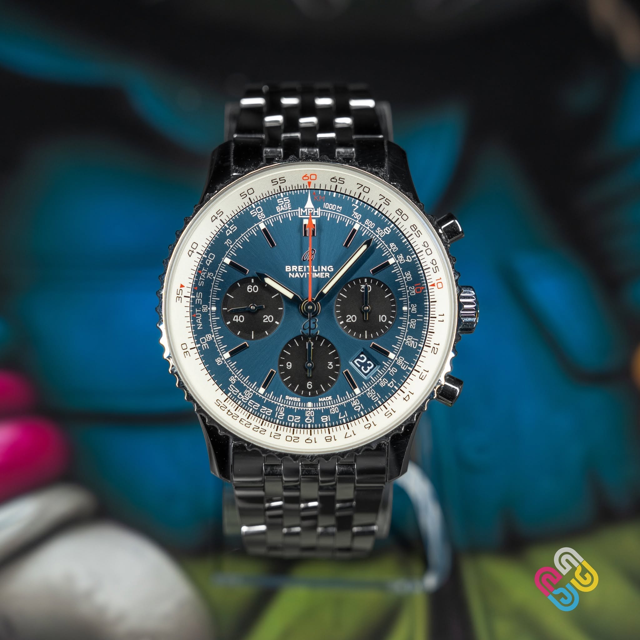 May be an image of wrist watch and text