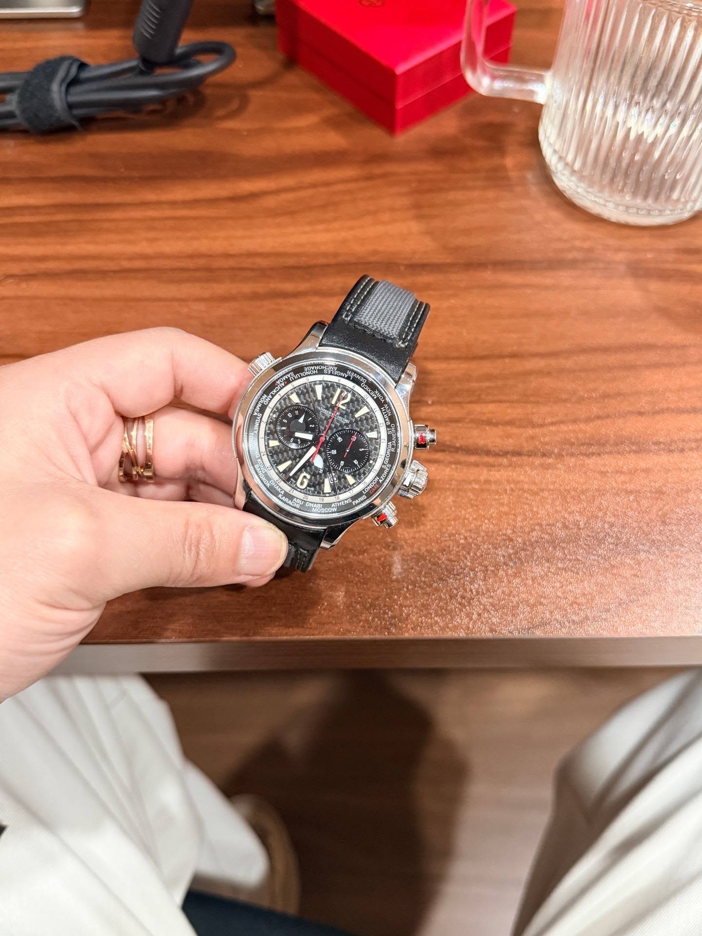 May be an image of wrist watch and text