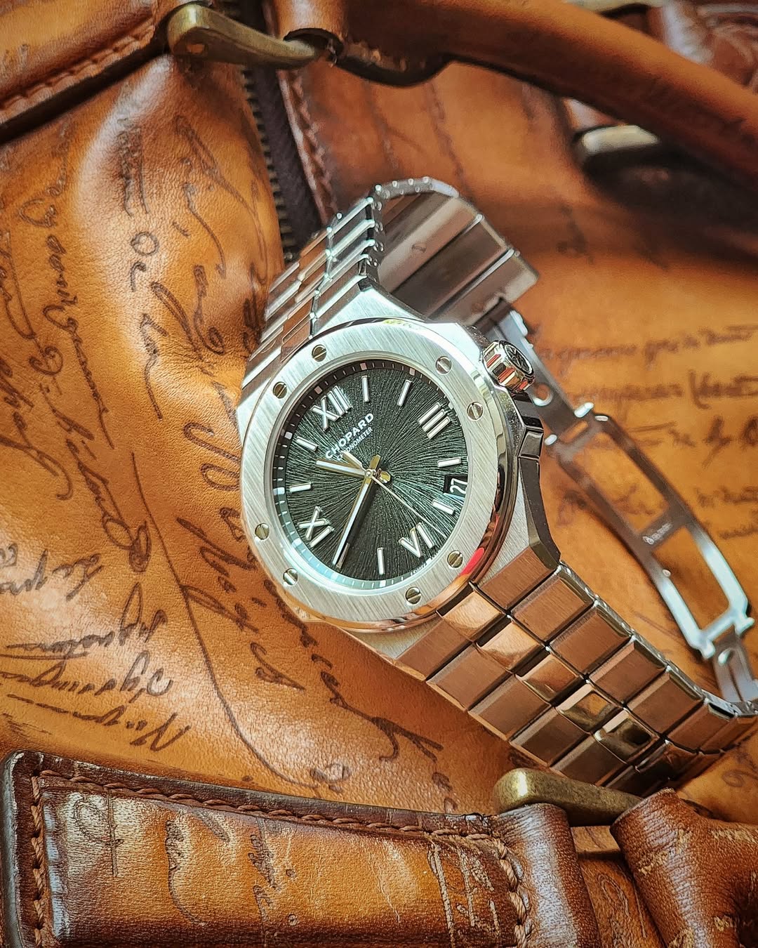 May be an image of wrist watch and text