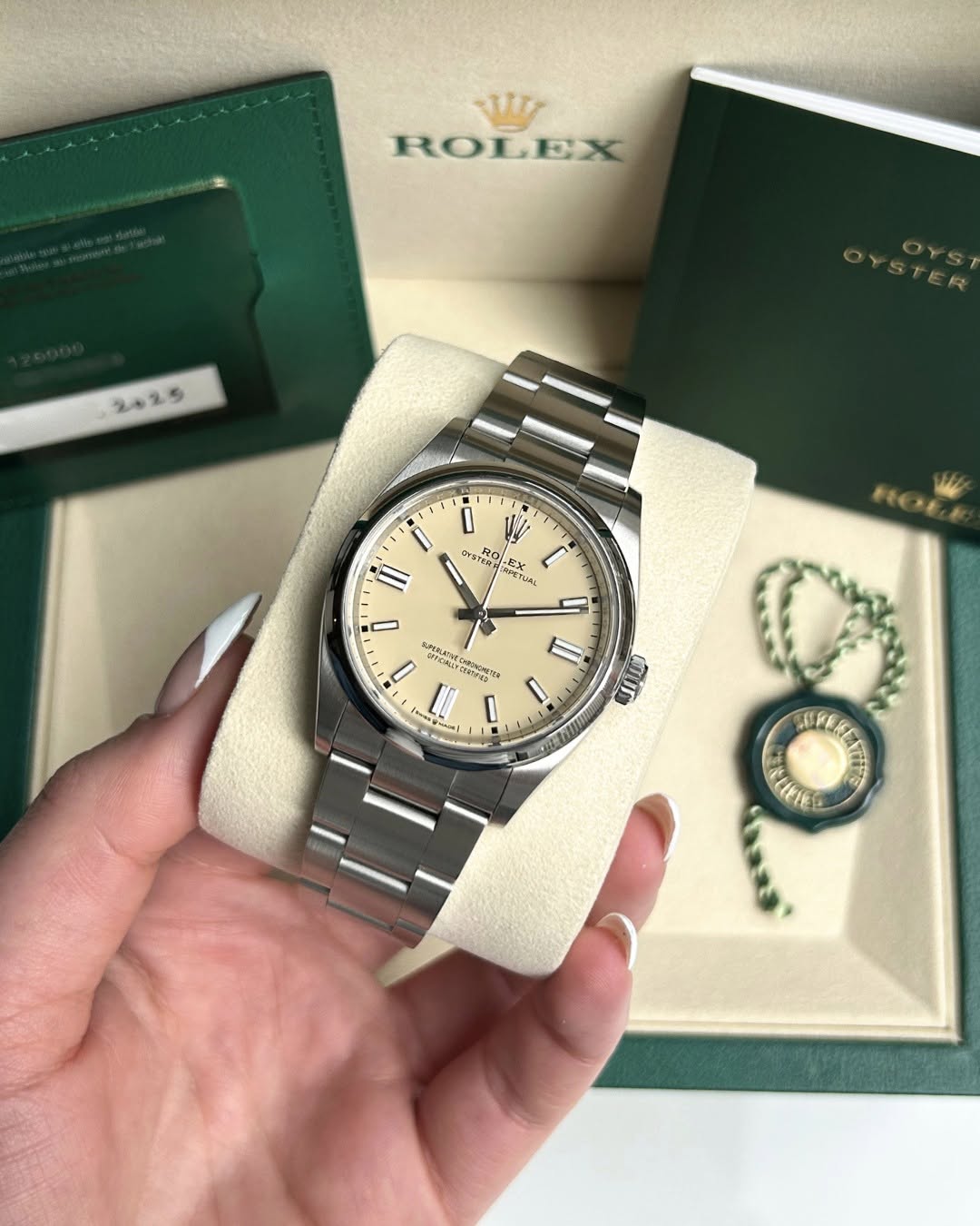 May be an image of wrist watch and text