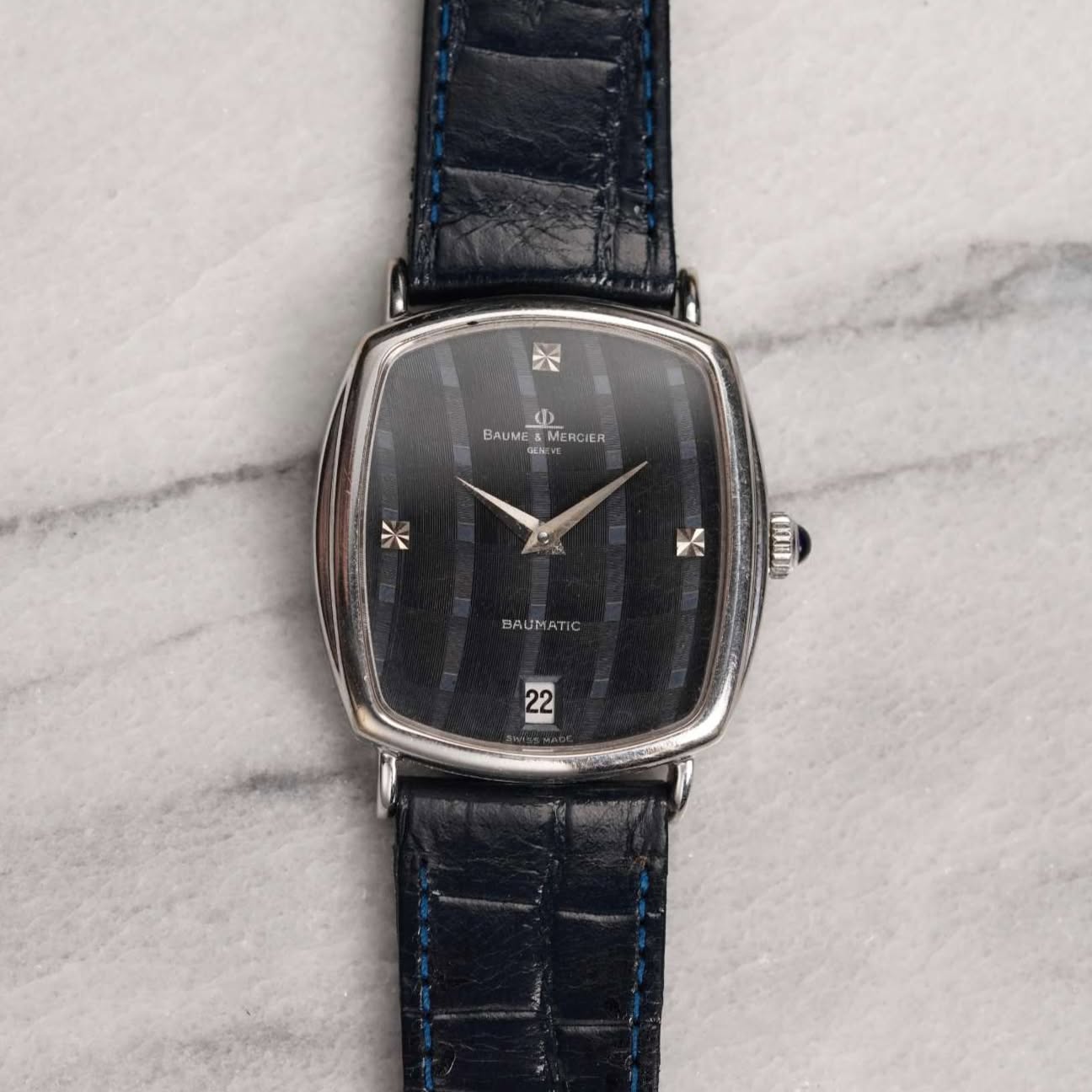 May be an image of wrist watch