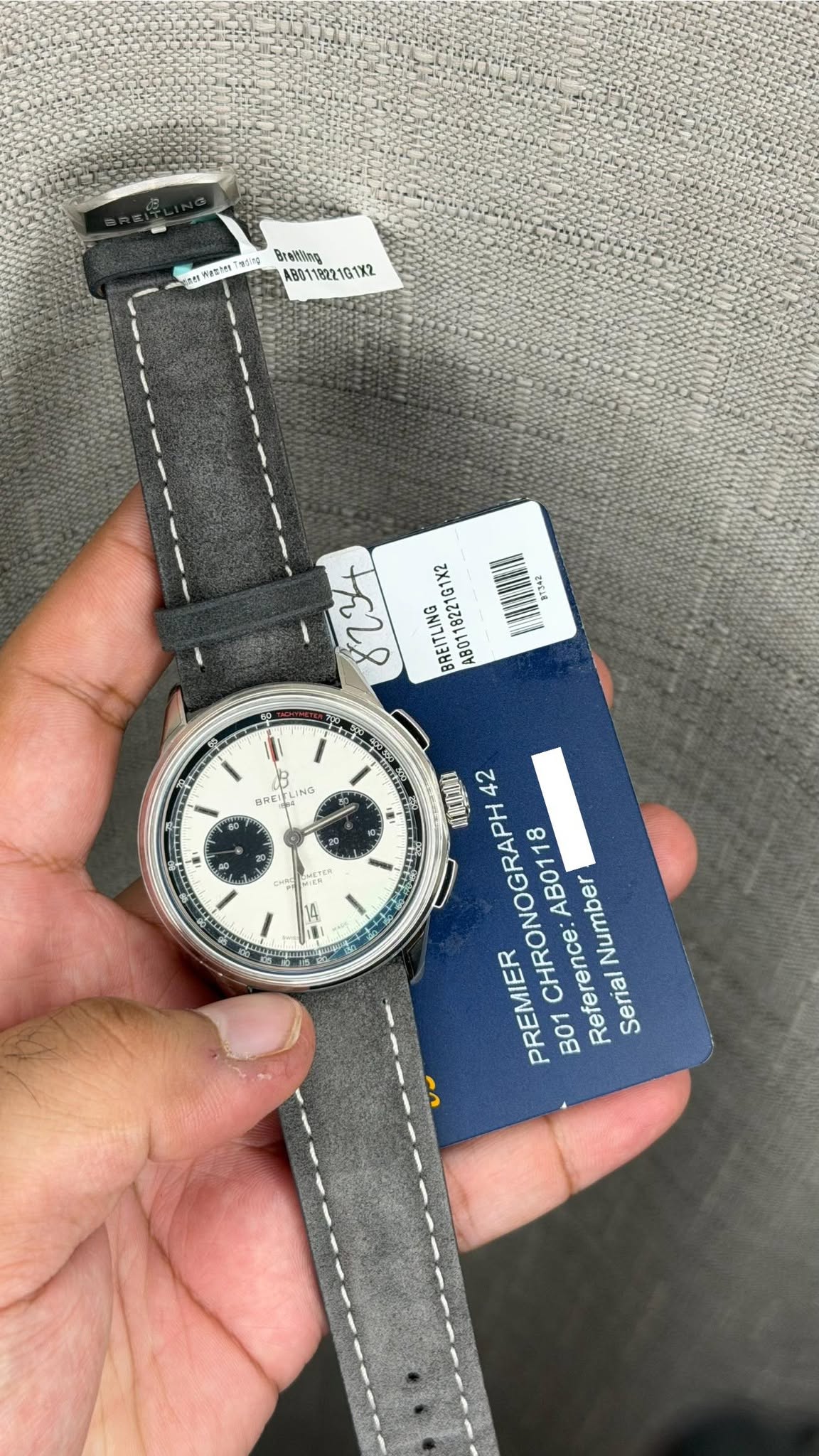May be an image of wrist watch and text