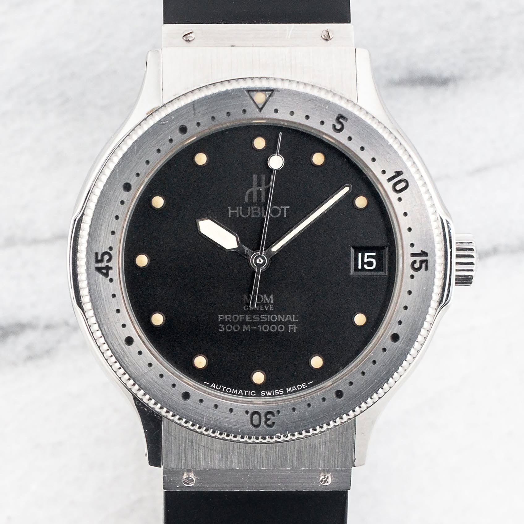 May be an image of wrist watch and text that says '. IONAL 101 AUTOMATIC SWISS MADE -AUTOMATICSWISSMADE- ي ΄σε'
