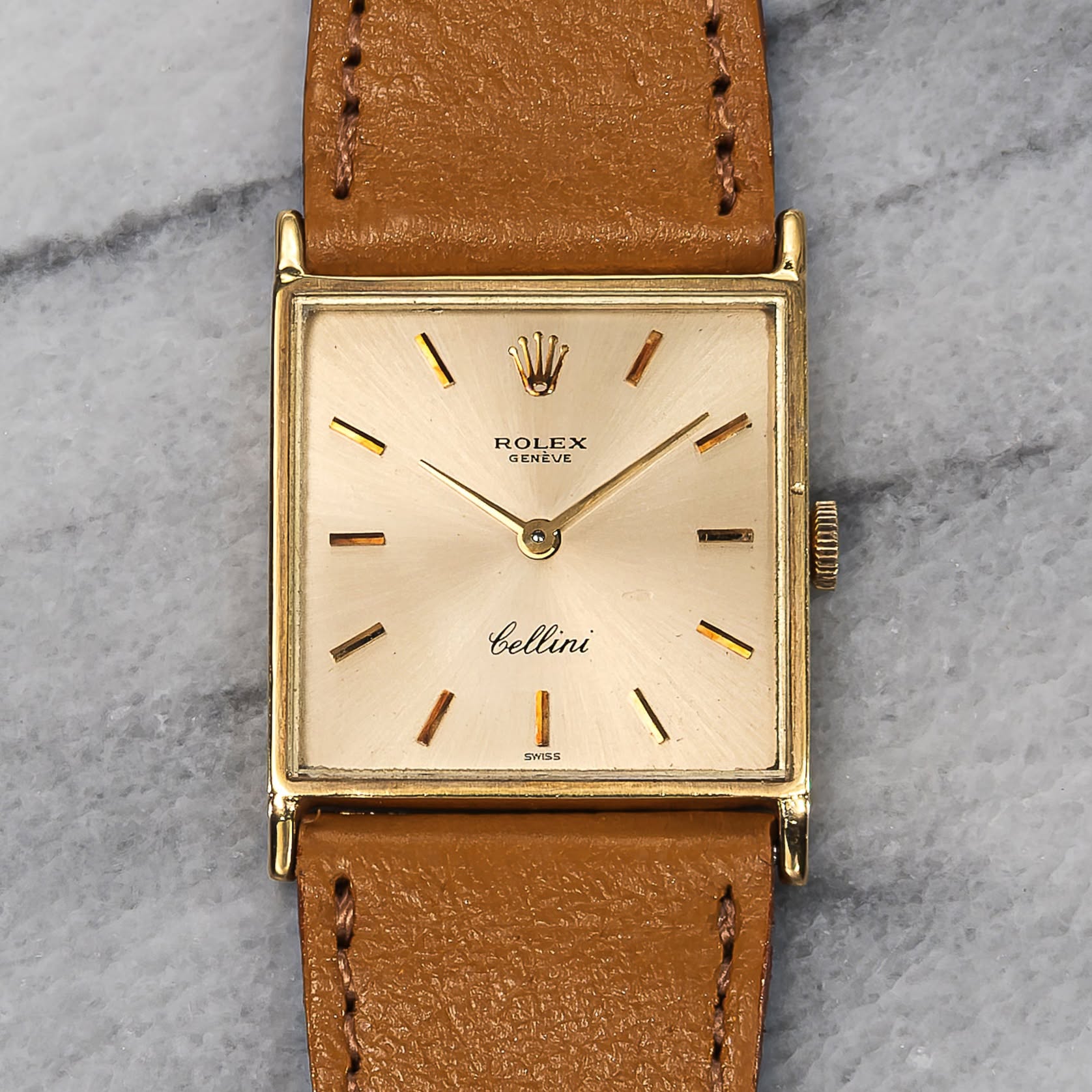 May be an image of leather and wrist watch