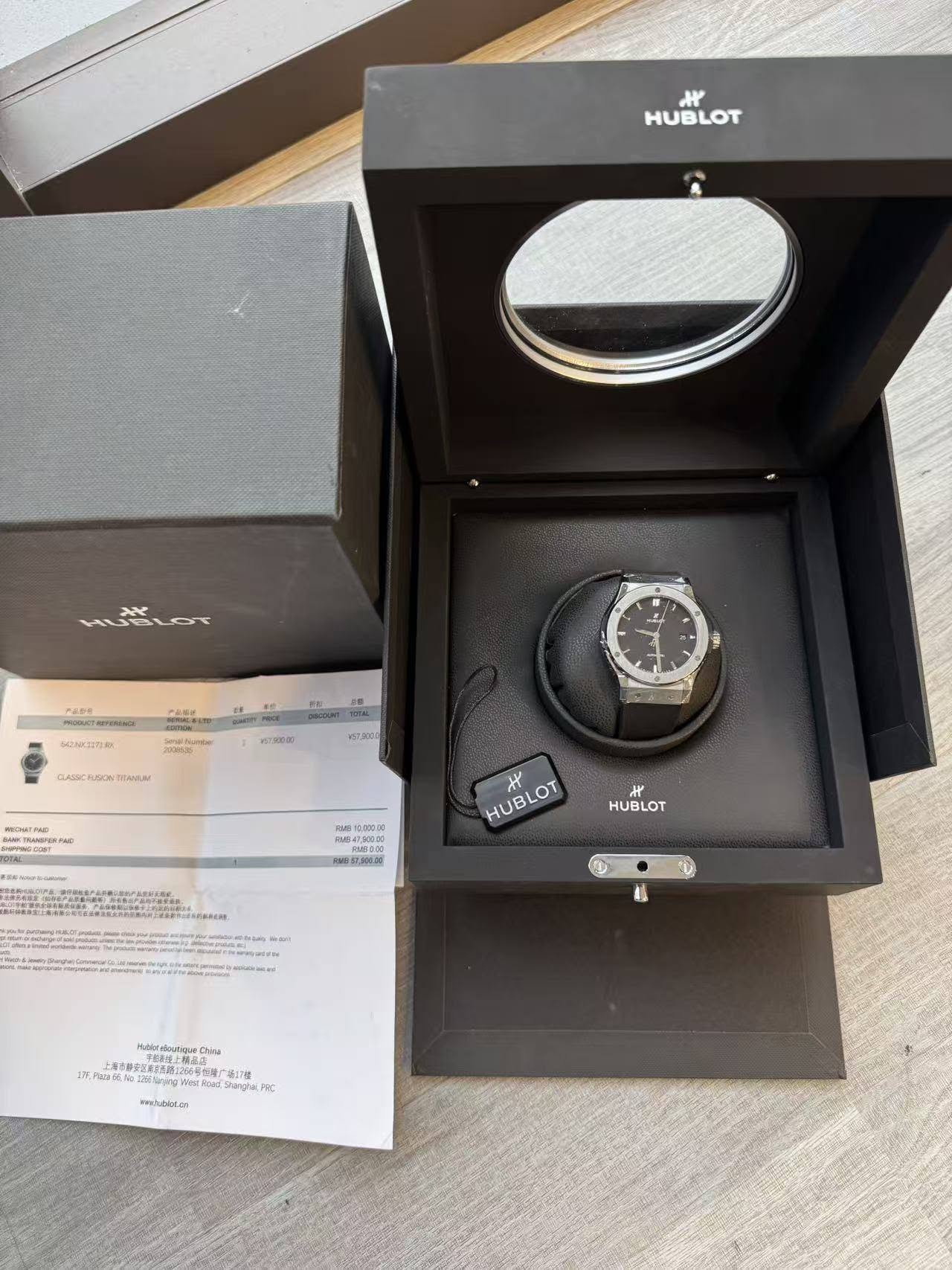 May be an image of digital watch, speaker and text