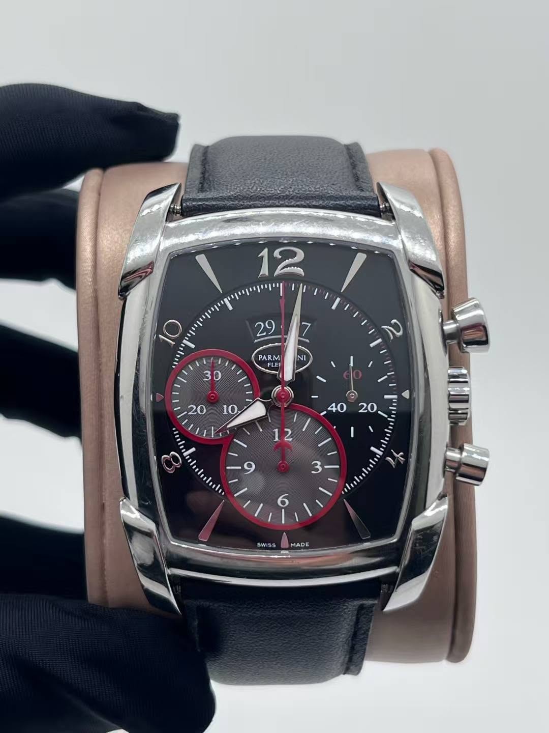 May be an image of wrist watch and text