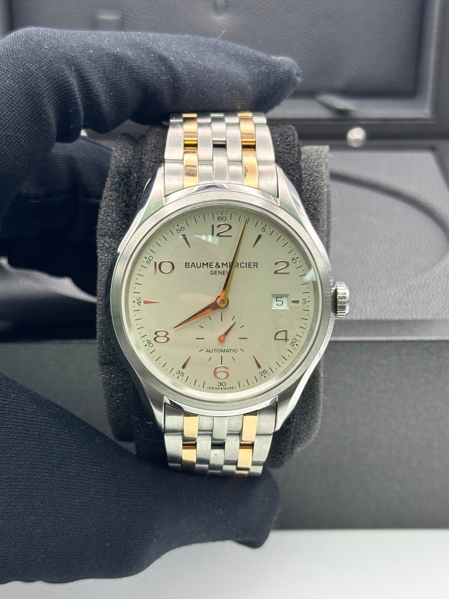 May be an image of wrist watch and text