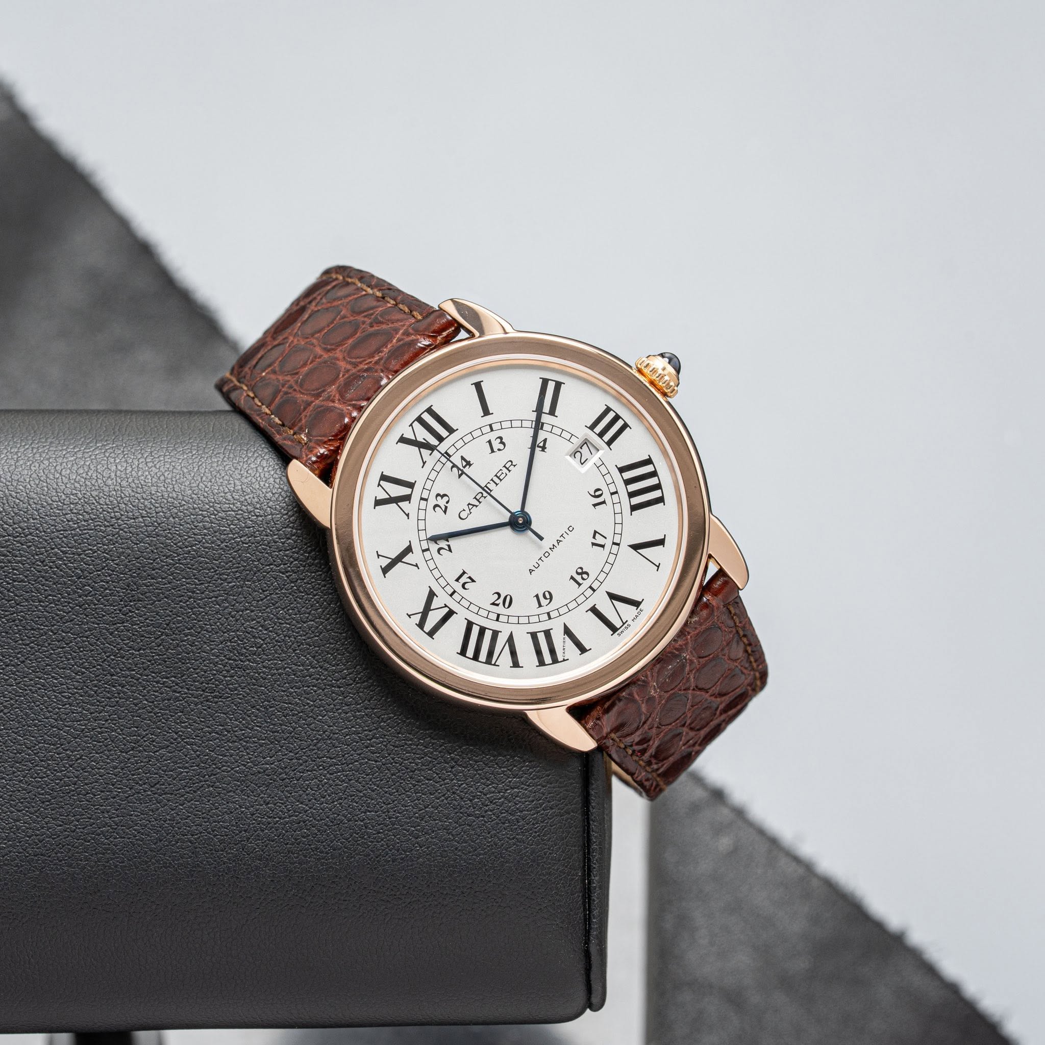 May be an image of wrist watch and leather