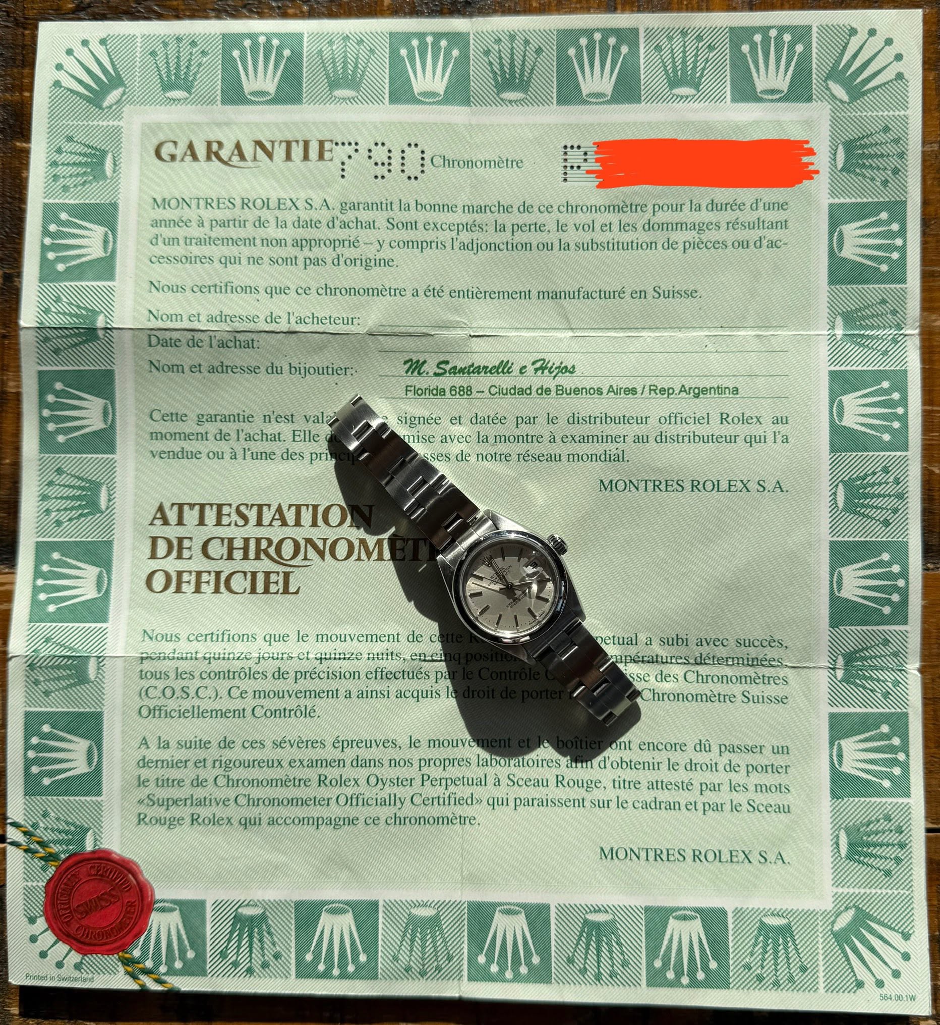 May be an image of wrist watch, ticket stub and text that says 'GARANTIE Chronomètre bonne ROLEX garantit chronomètre pour aninée dela d'achat perte. traitement approprié compris…