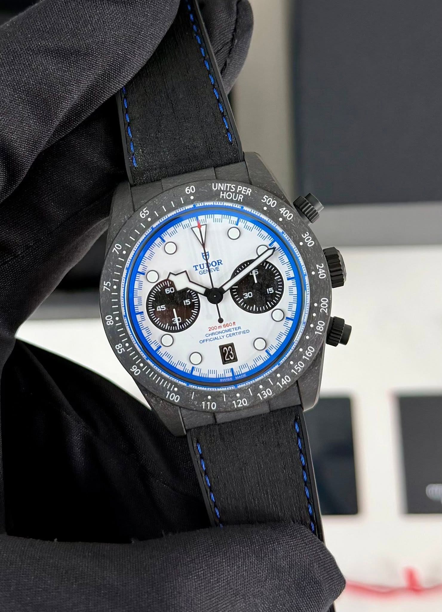 May be an image of wrist watch and text