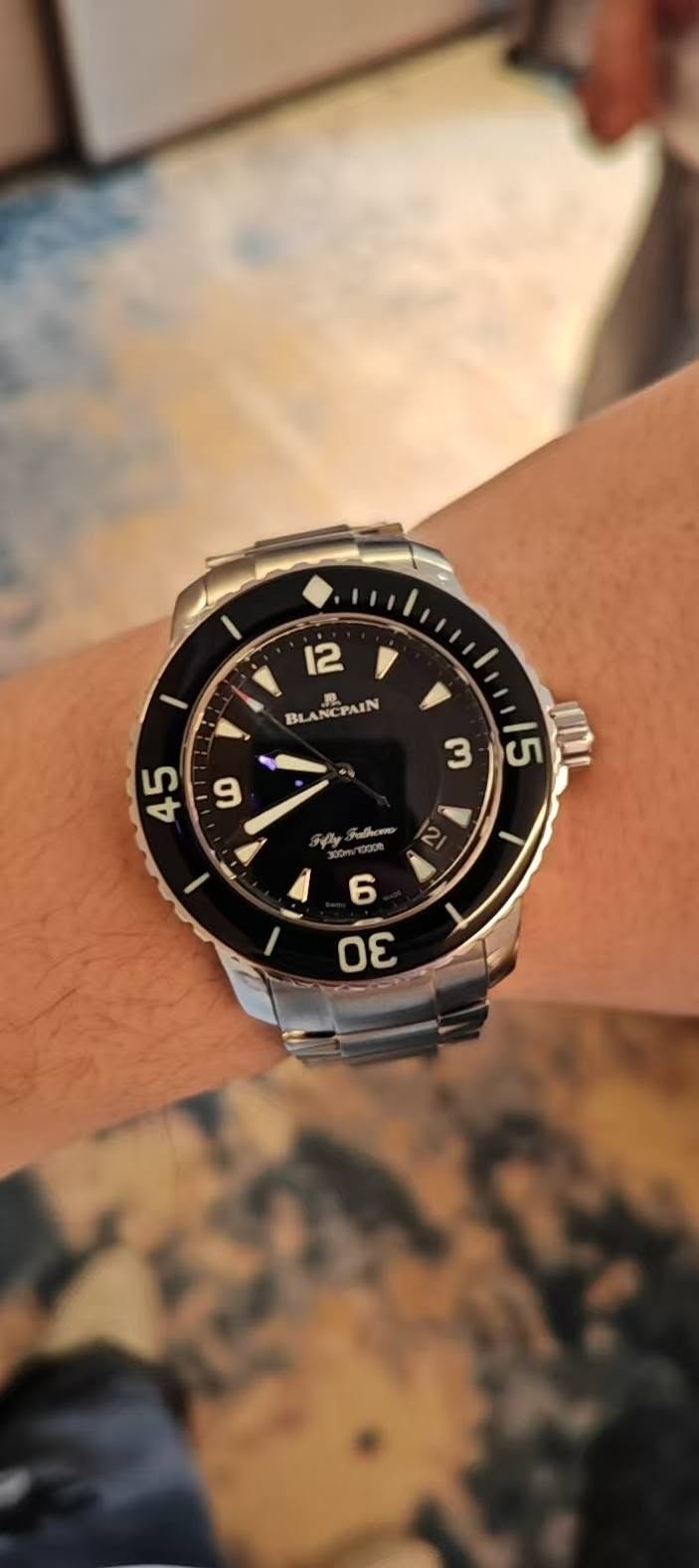 May be an image of wrist watch and text that says 'I 12 JL NEPAIN PAIN BL ዮ Ka 6 σε'