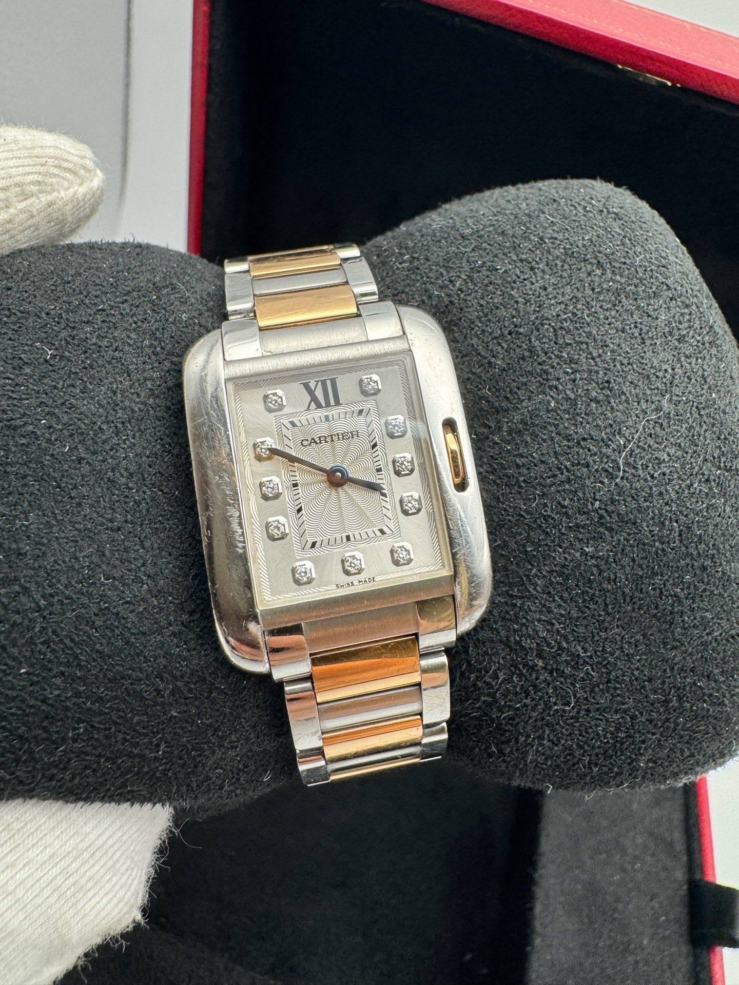May be an image of wrist watch and text that says 'จวง XII ป 密 H K 愛 m5S HAM'