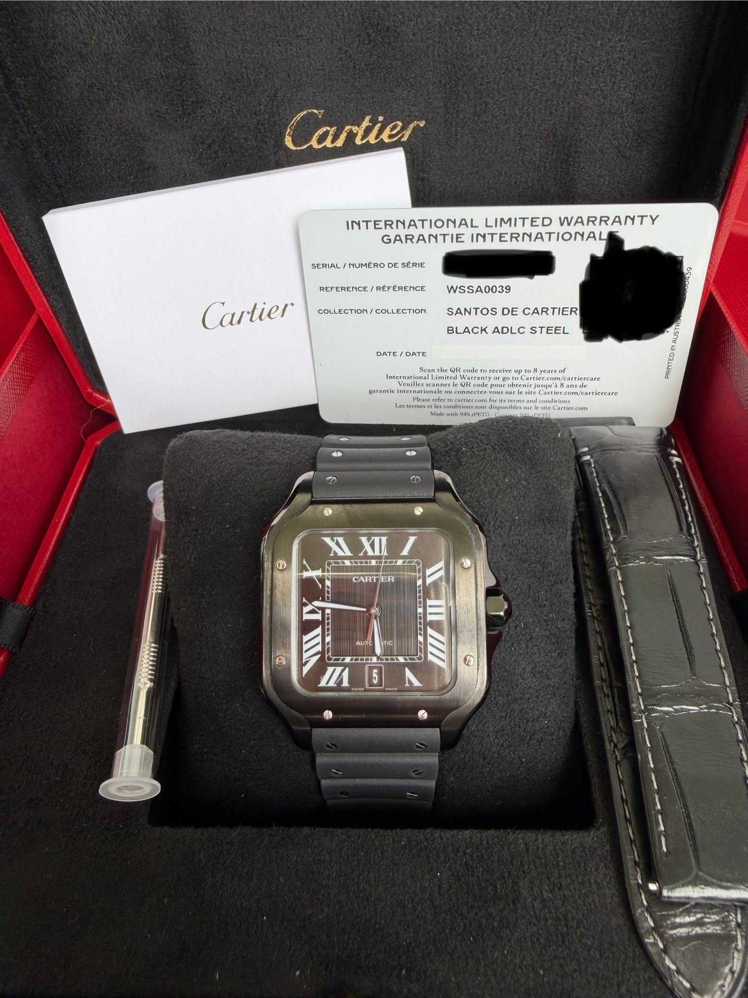 May be an image of wrist watch and text that says 'Cartier SERIAL MUMERO INTERNATIONAL LIMITED WARRANTY GARANTIE GARANTIEINTERNATIONAL INTERNATIONALE SERIE REFERENGE REFERENCE…