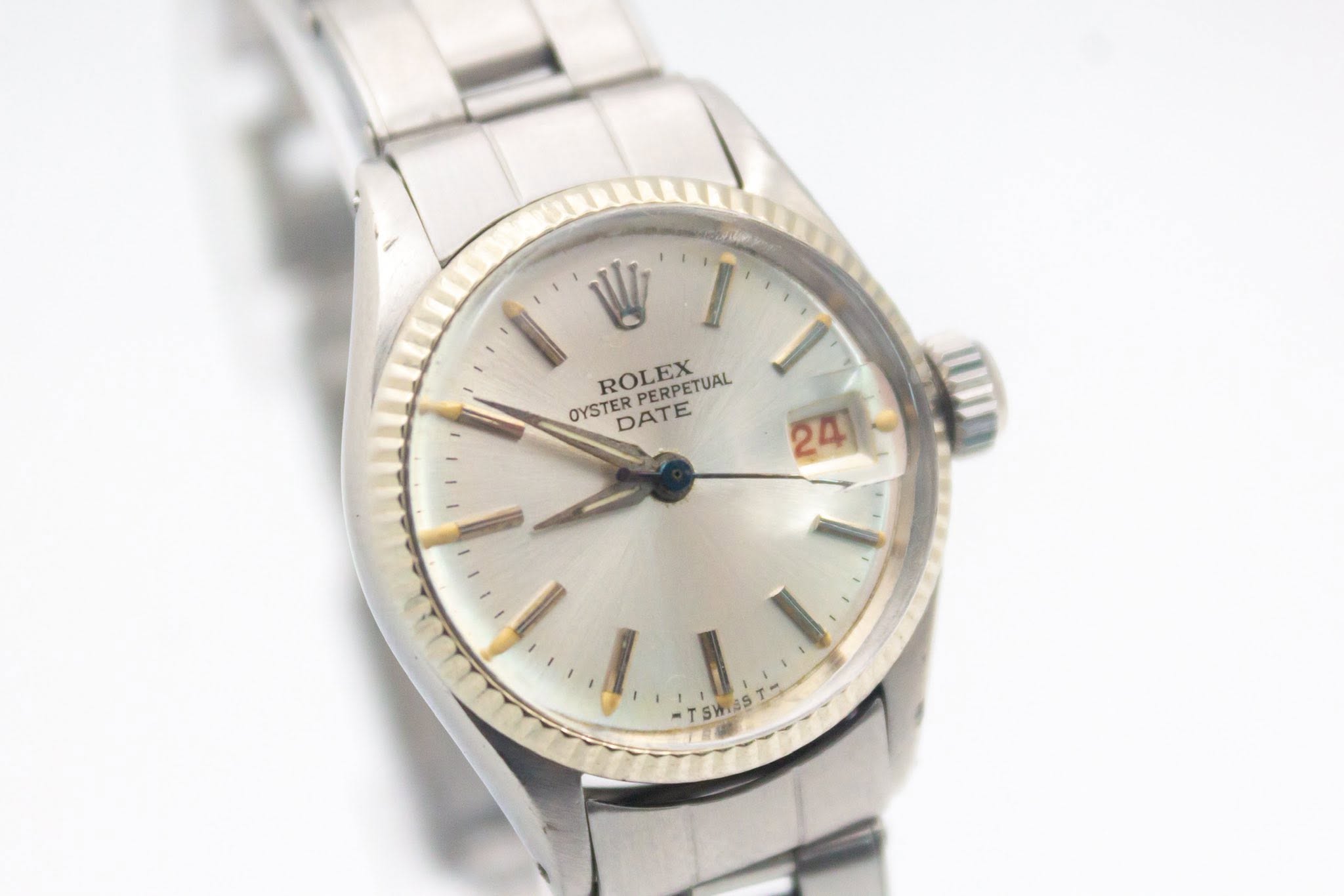 May be an image of wrist watch and text that says '1 W I ROLEX PERPETUAL OYSTERPERPETUAL EX OYSTER DATE 24 TSWaS TSWaST SW И ต'
