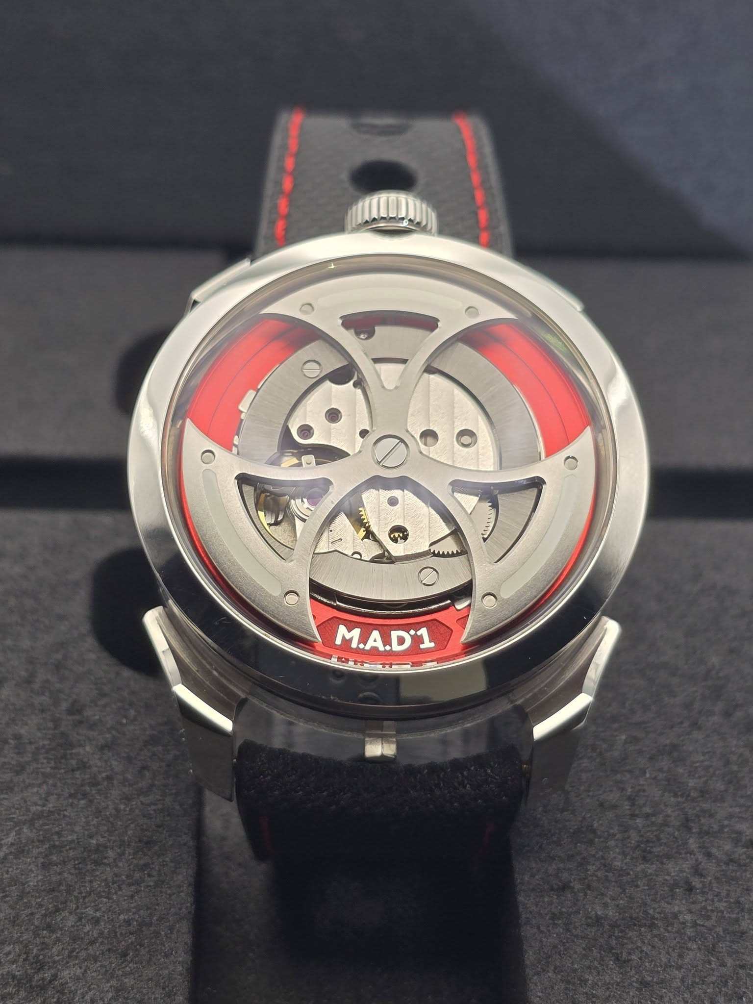 May be an image of wrist watch and text