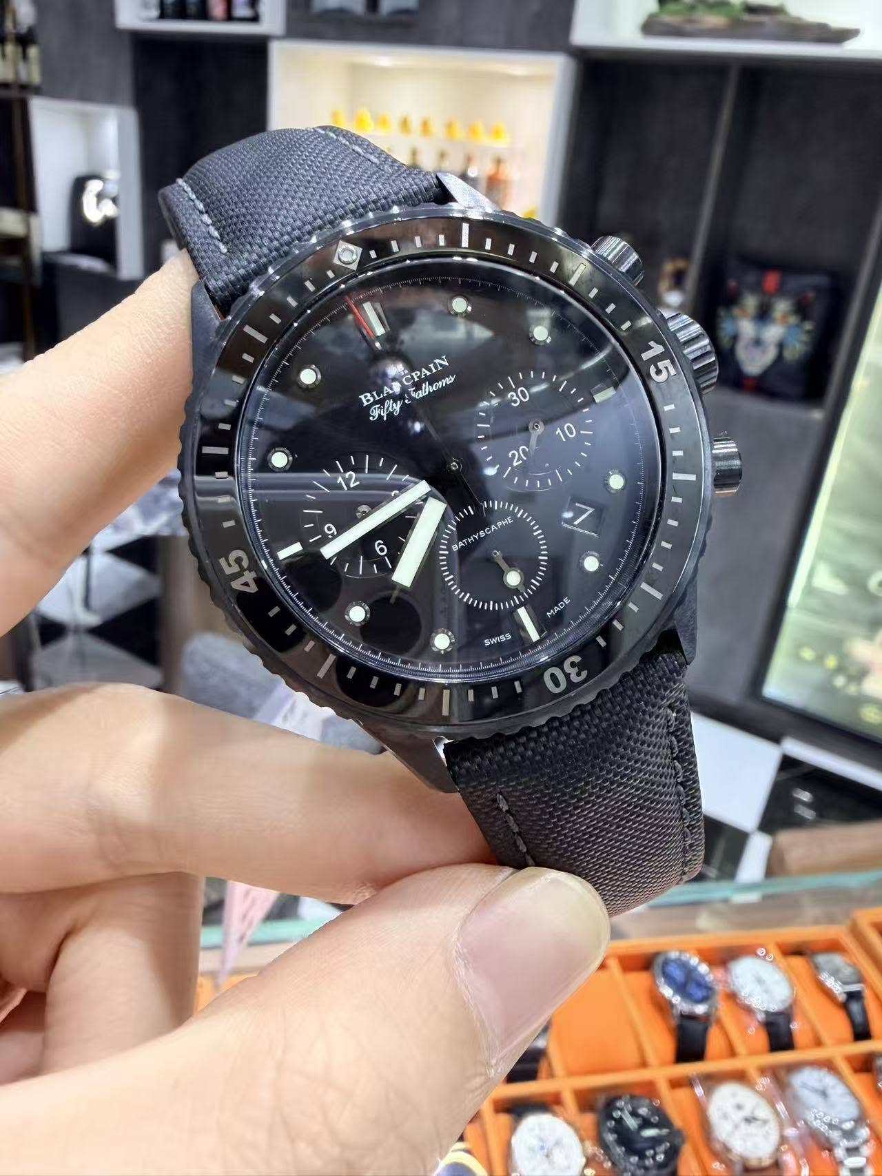 May be an image of wrist watch and text
