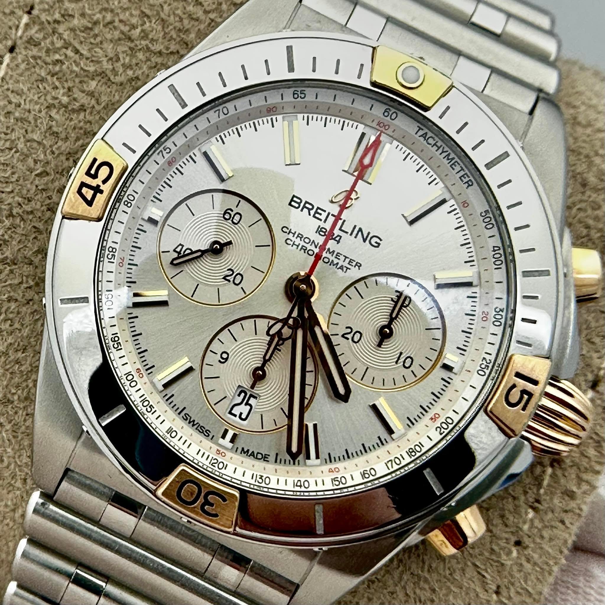 May be an image of wrist watch and text
