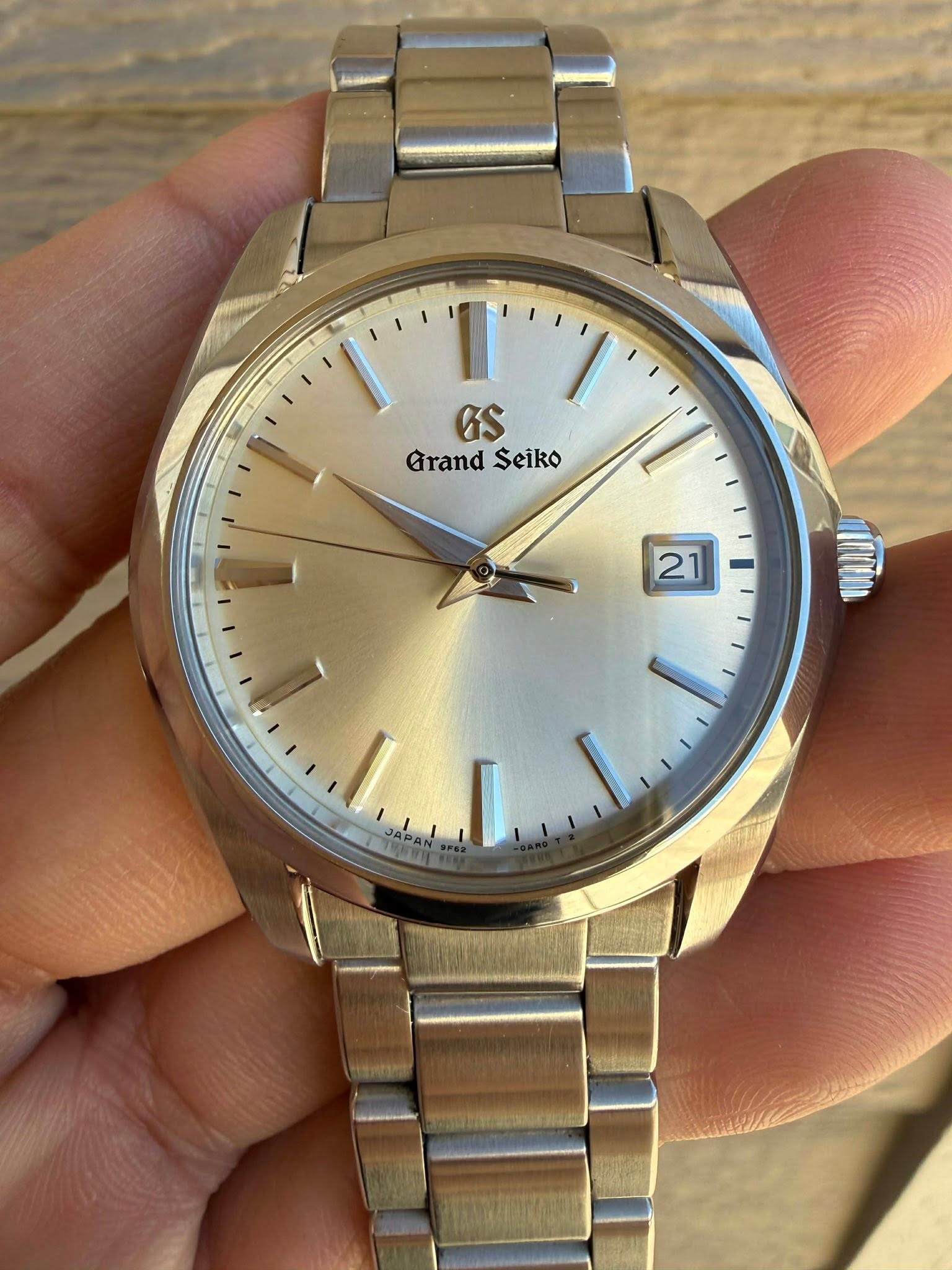 May be an image of wrist watch and text that says 'GS Grand GrandSeiko Seiko 21'