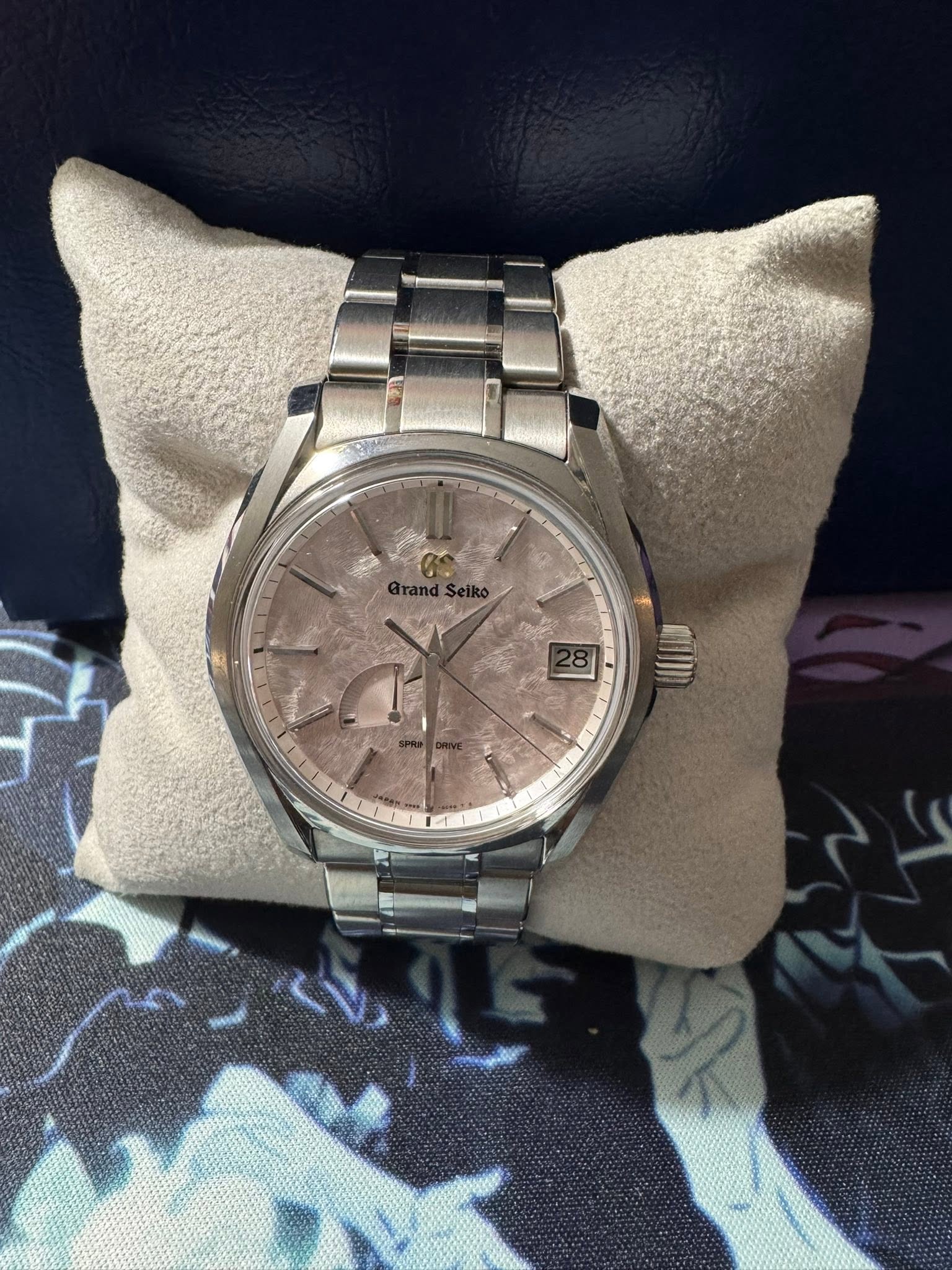 May be an image of wrist watch and text