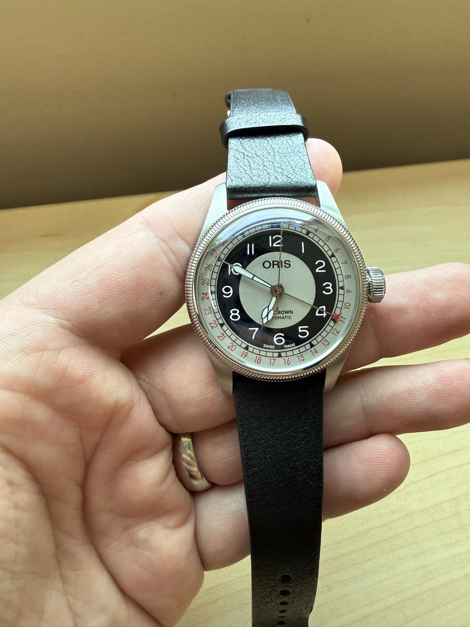 May be an image of wrist watch