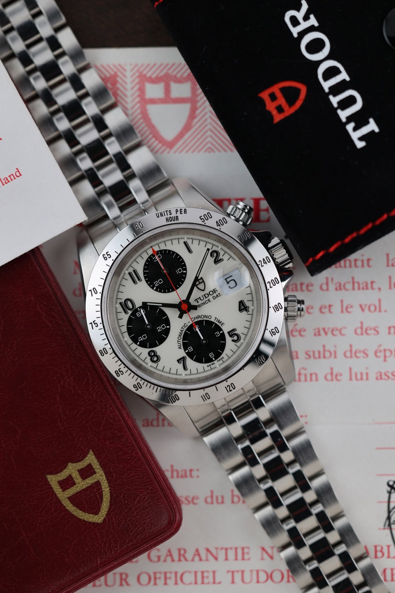 May be an image of wrist watch and text