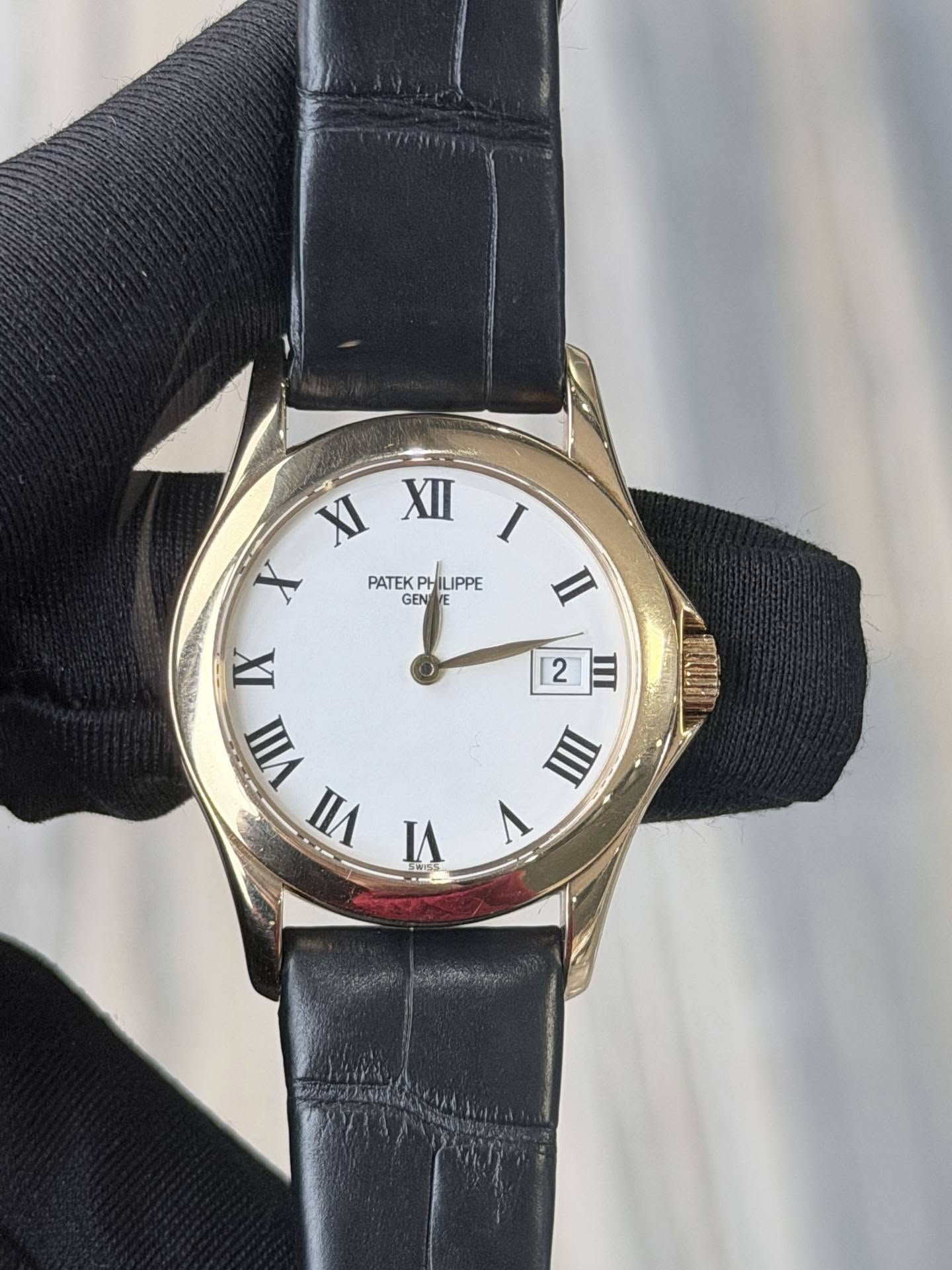 May be an image of wrist watch and text that says 'XI XH I X PATEKPHILIPPE ILIPPE PATEK GEN II 2 III XI 三 IIIII VI 1 Λ'
