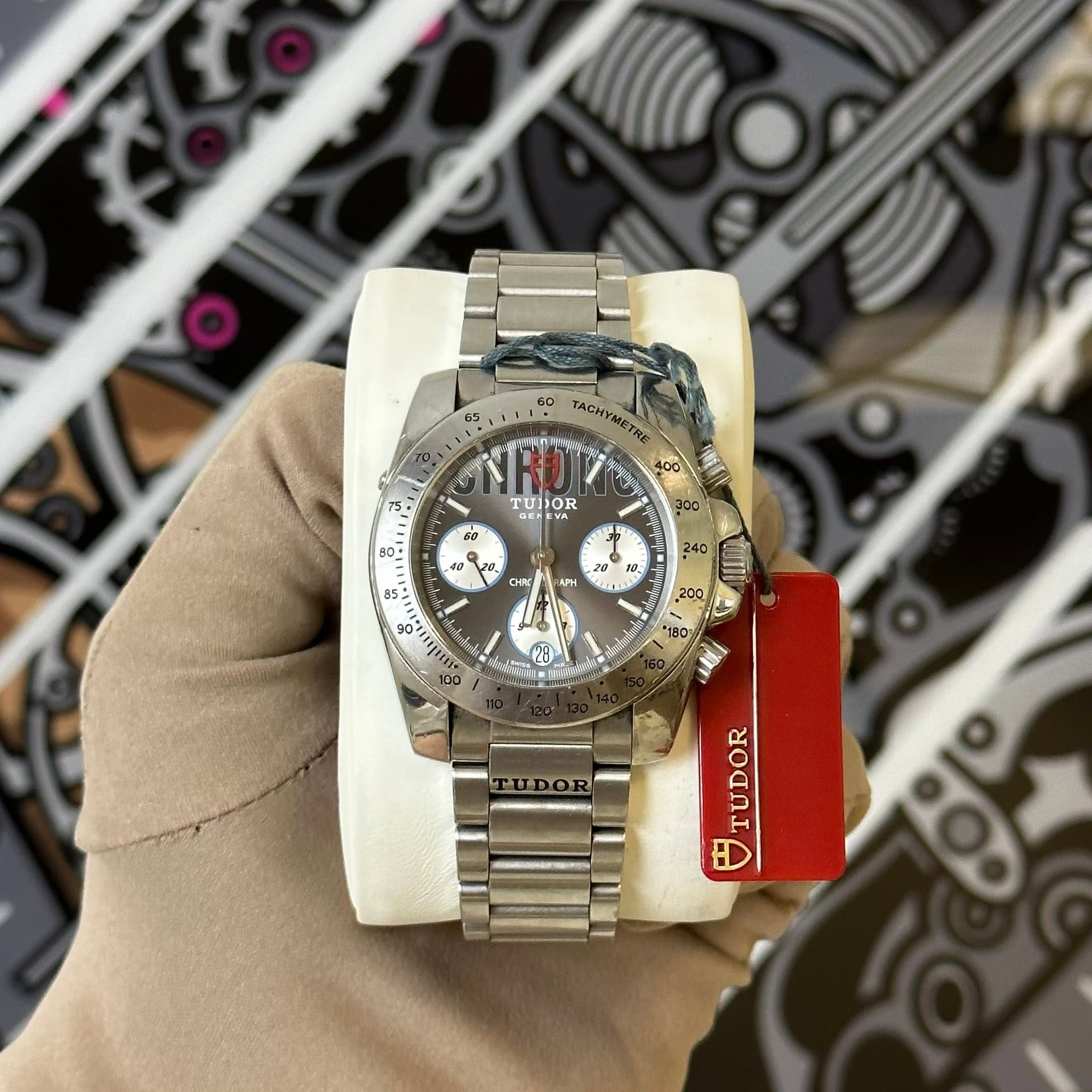 May be an image of wrist watch and text that says 'METRE TuI TUDOR 60 60 0و 0 ? 48 La 20 و OHPE + 28 28 J 1O- APH 1 28 "180 TUDOR TUDOR y 8'