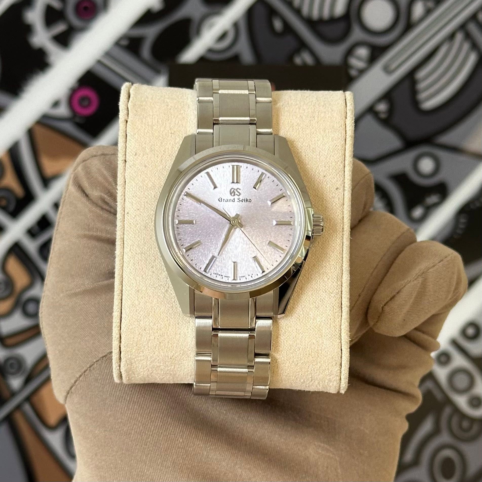 May be an image of wrist watch and text