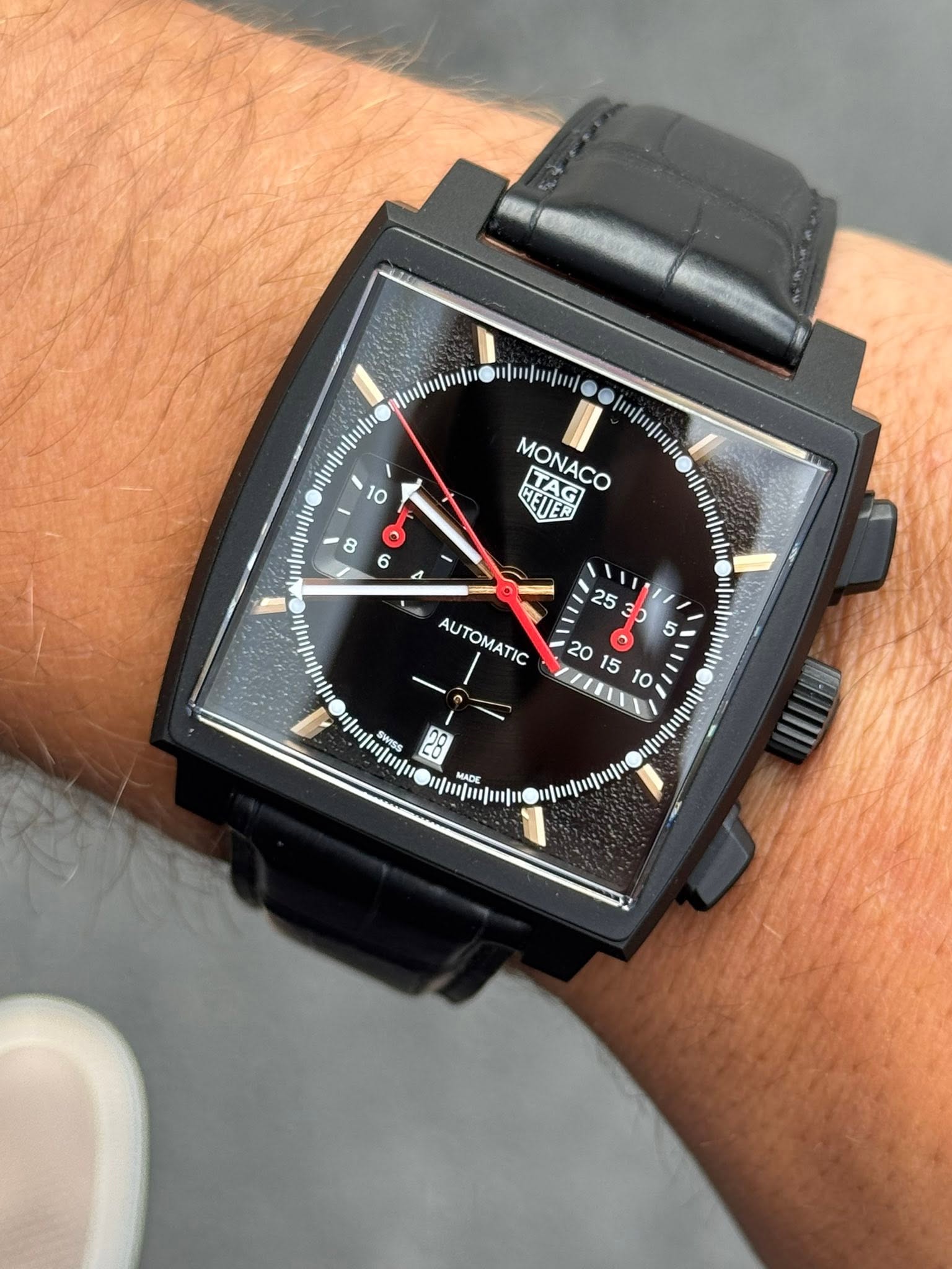 May be an image of digital watch and text