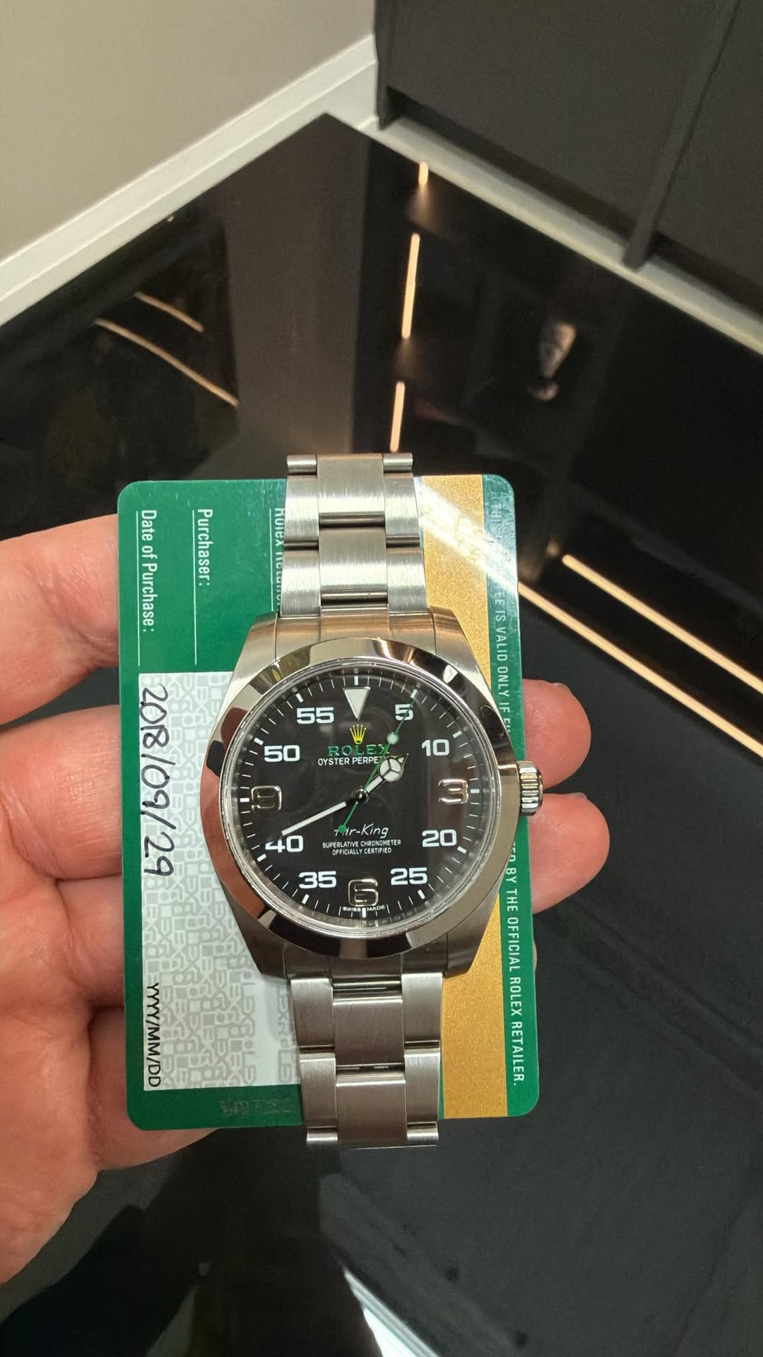 May be an image of wrist watch and text