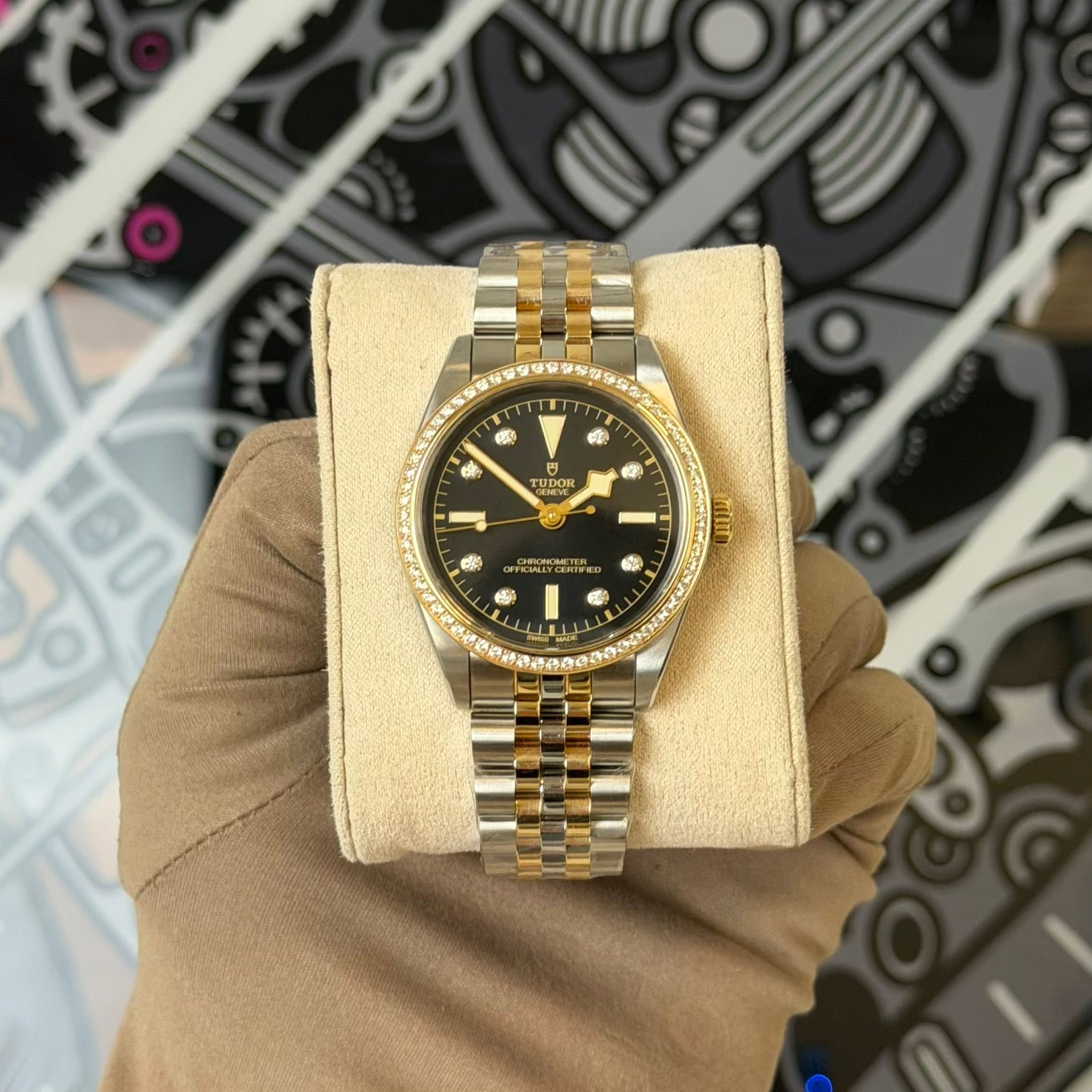 May be an image of wrist watch and text